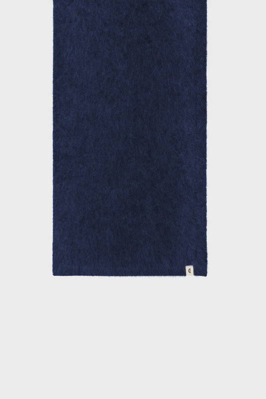 Folded view emphasizing the smooth, lightweight cashmere texture.