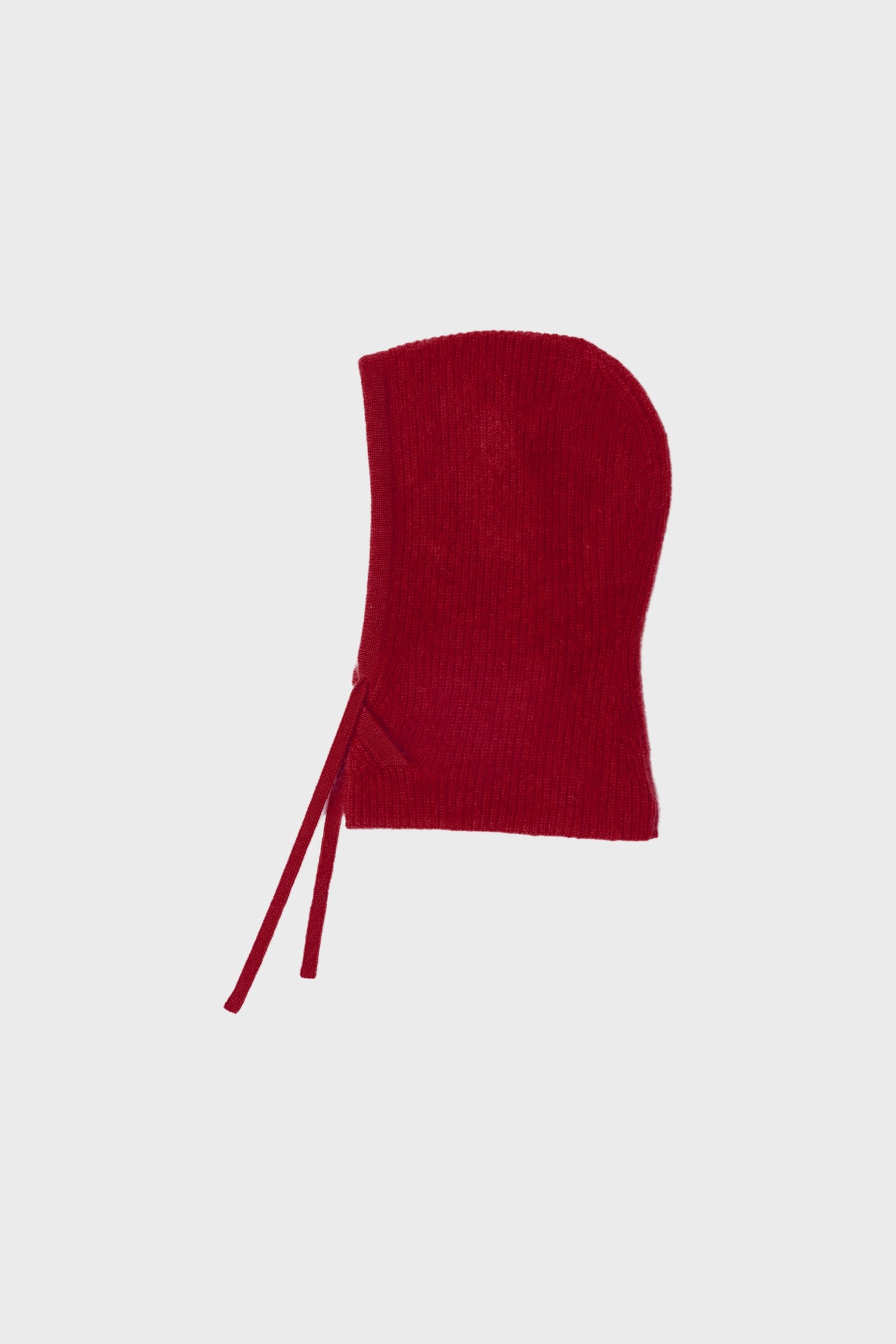 Rear view displaying the hooded shape and fluffy knit texture.