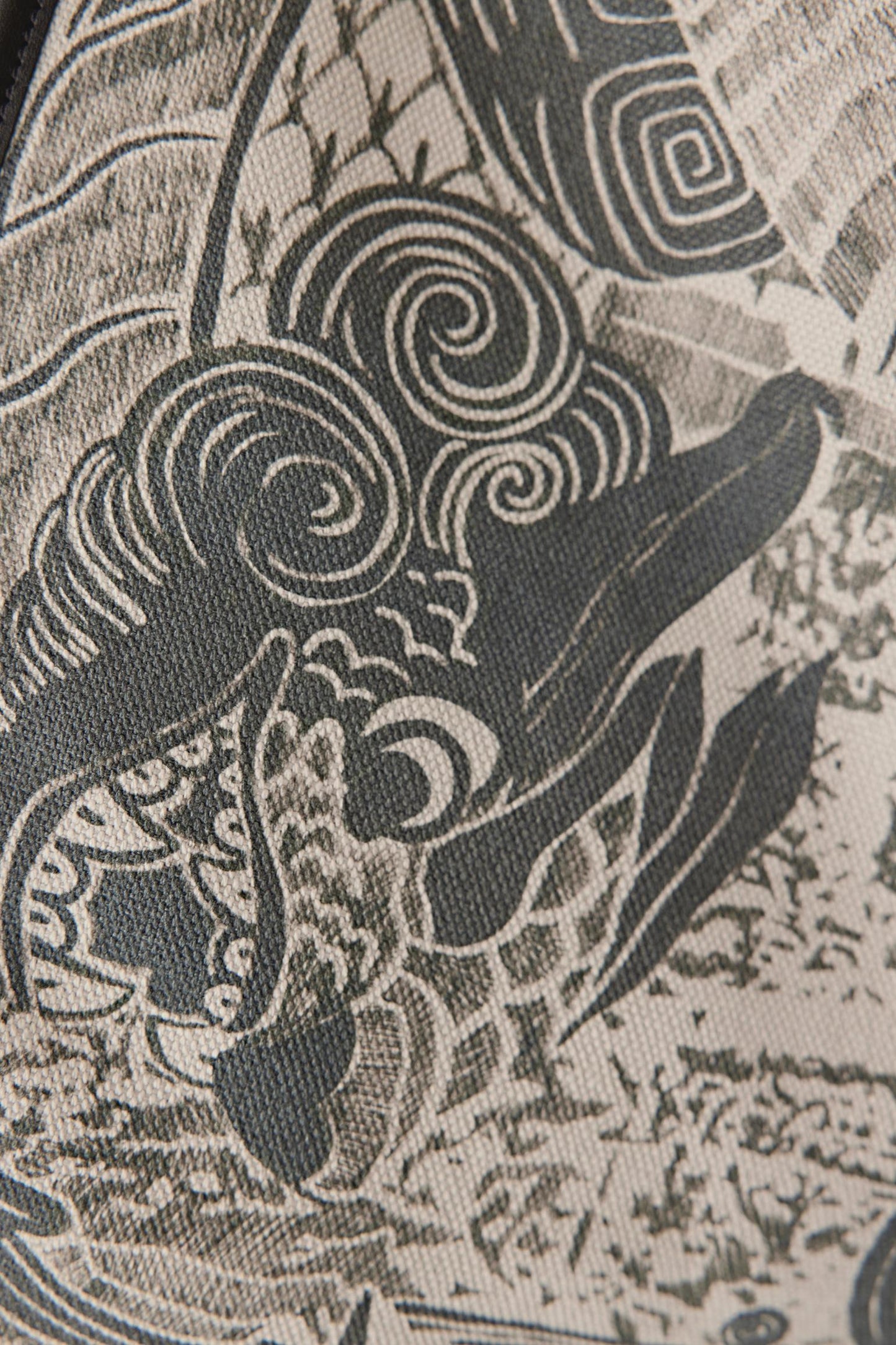 Close-up of a textured fabric with intricate patterns and designs.