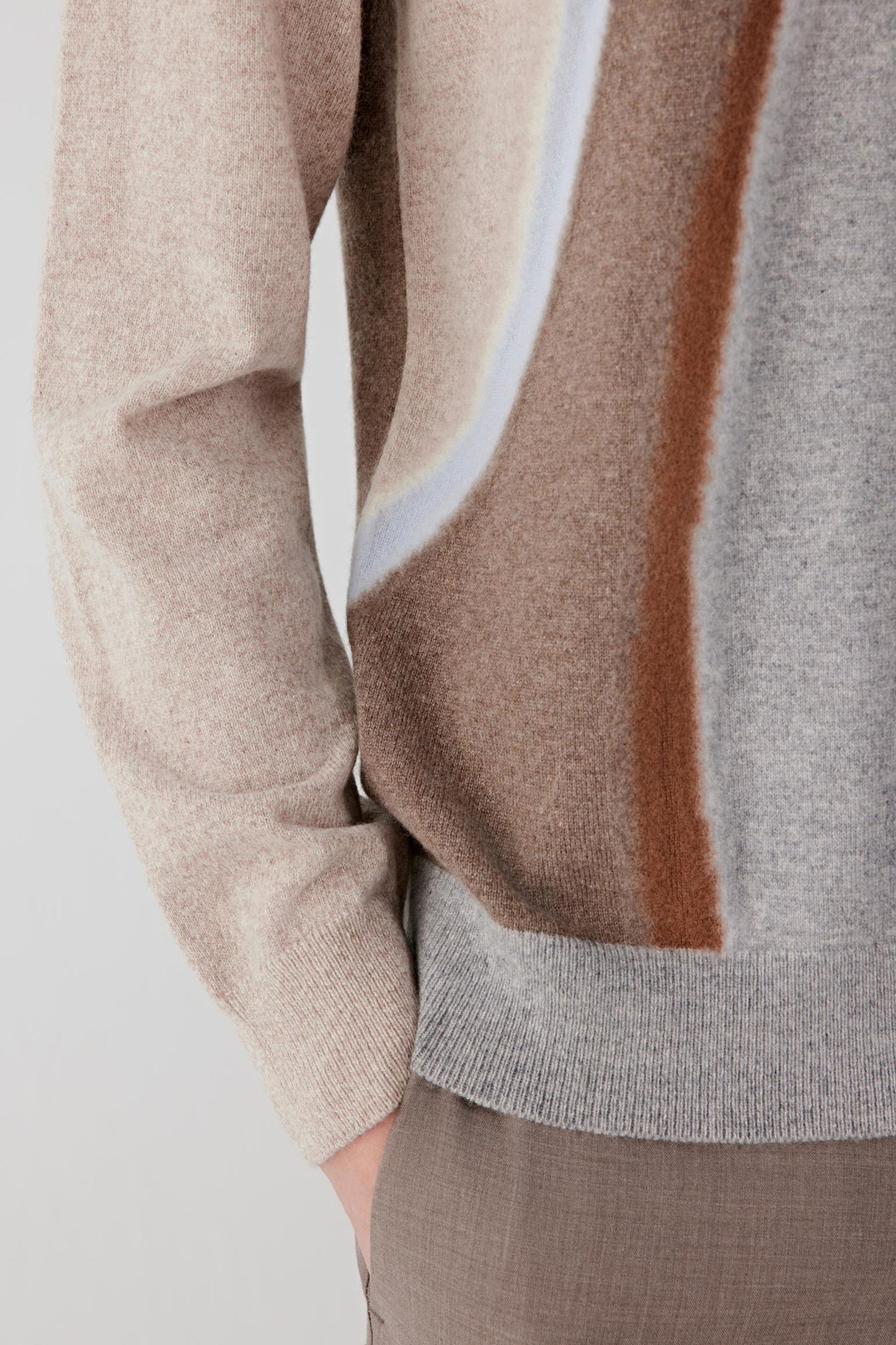Fabric detail showing the fine, soft cashmere knit with a slightly brushed texture.