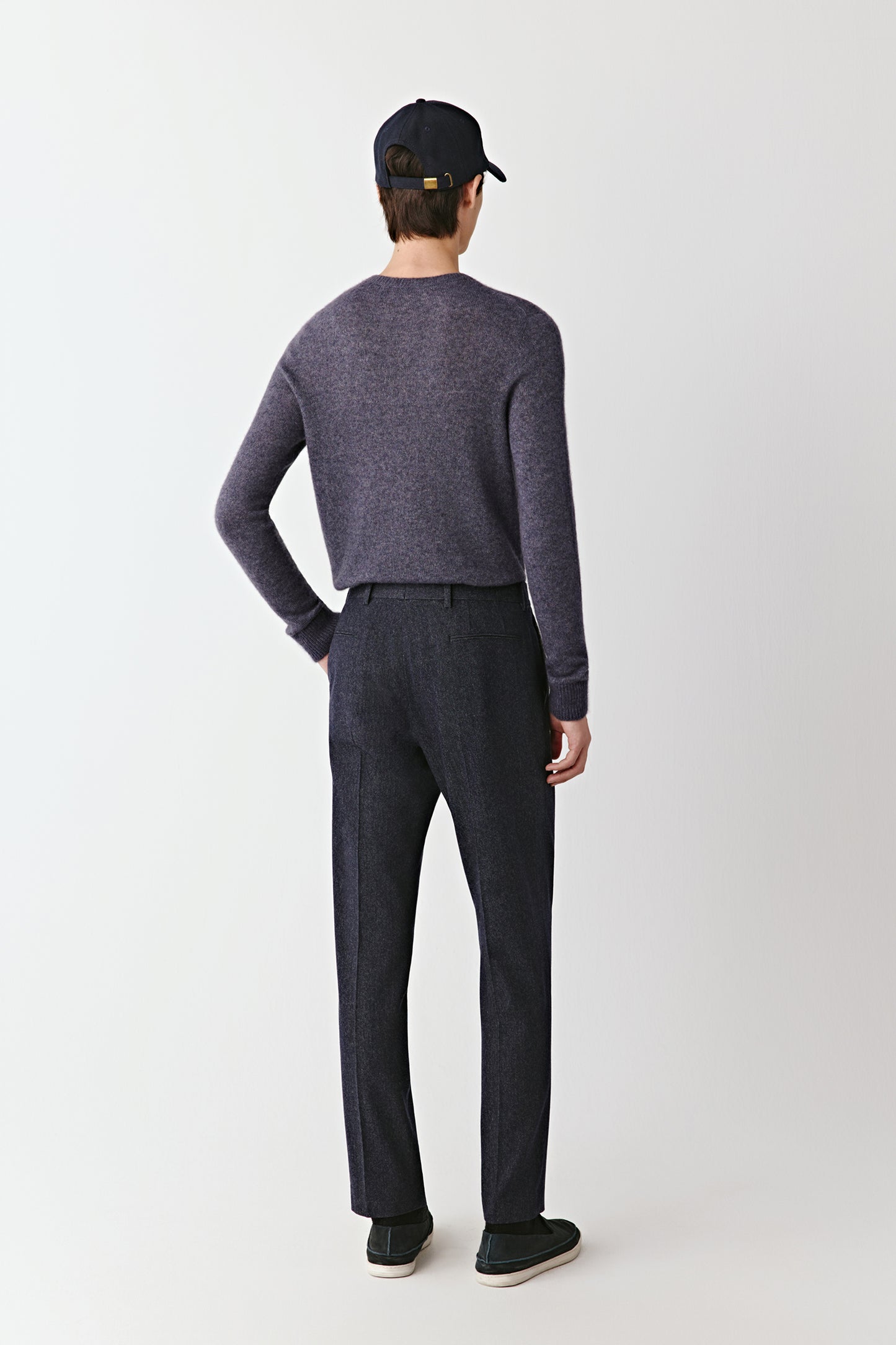 Rear view highlighting the smooth back panel and relaxed fit.