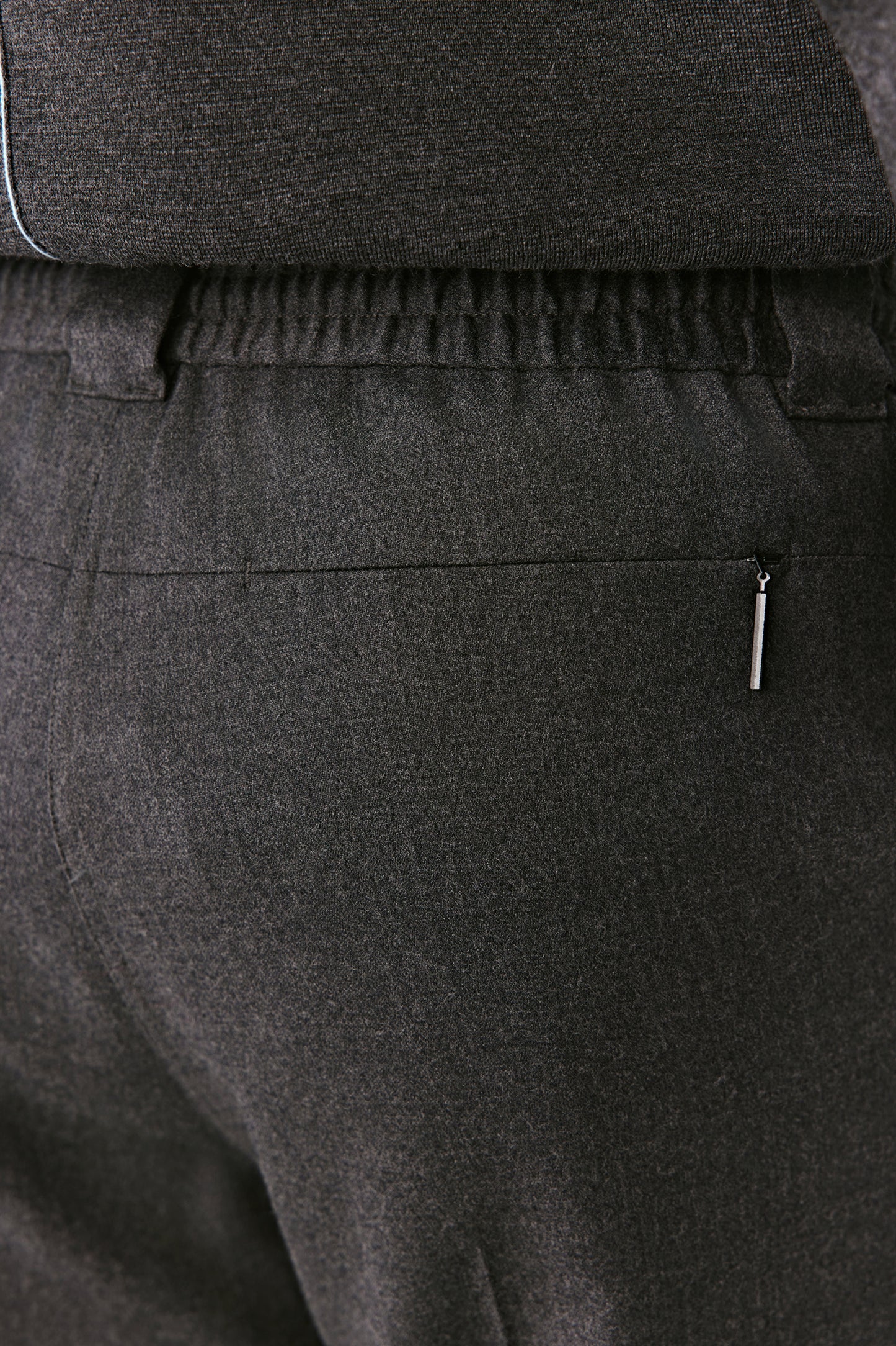 Rear angle showing the structured waistband and smooth fall.