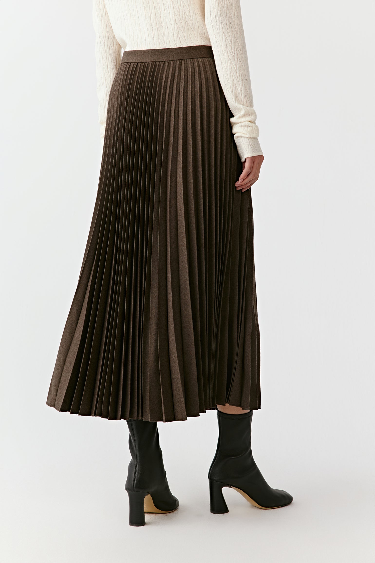 The texture of the wool is visible in the soft interplay between light and shadow.