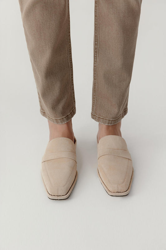 Top view highlighting the smooth suede surface and the minimal seam detail across the upper.
