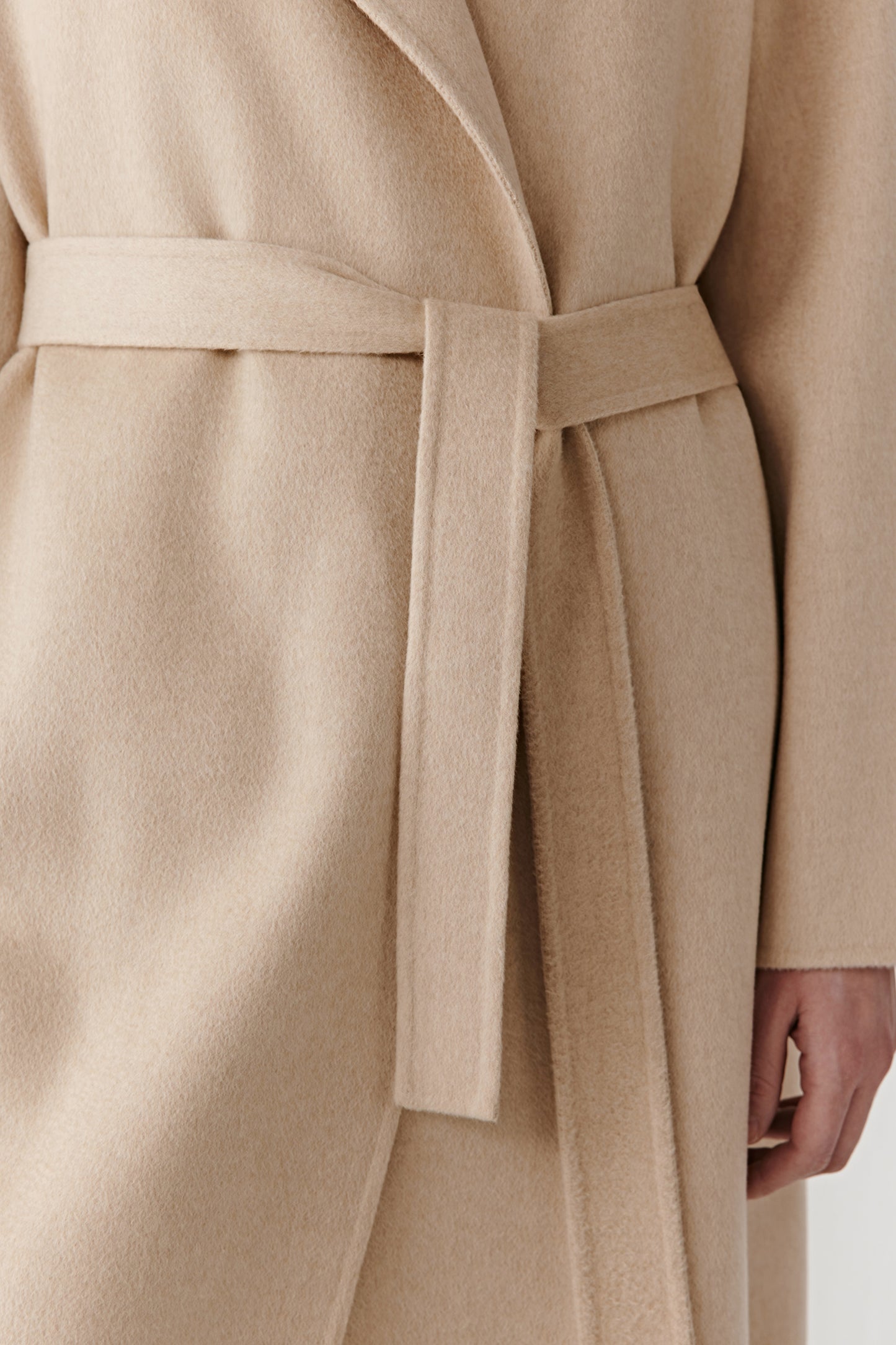 Close-up of the belt highlighting its meticulous finish and soft texture.