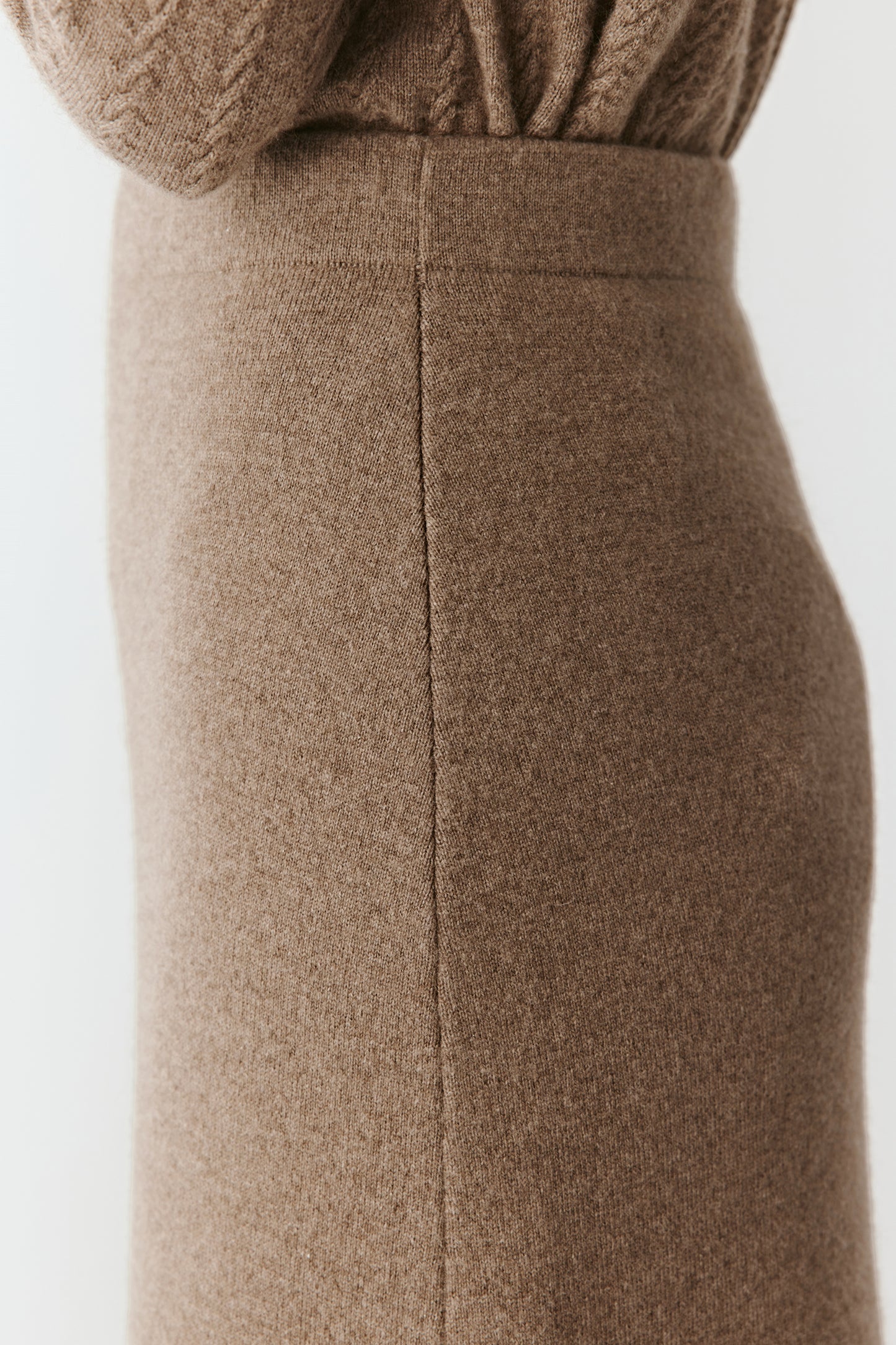 Close-up of the waistband and fine ribbing detail.