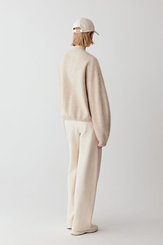 Back view focusing on the even texture and relaxed drape of the cashmere.