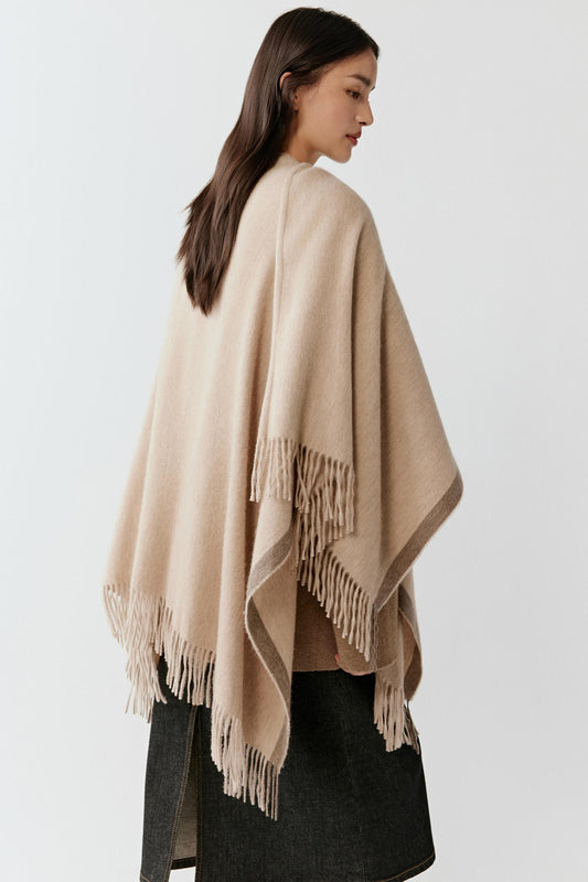 Side view highlighting its natural hue and soft cashmere texture.