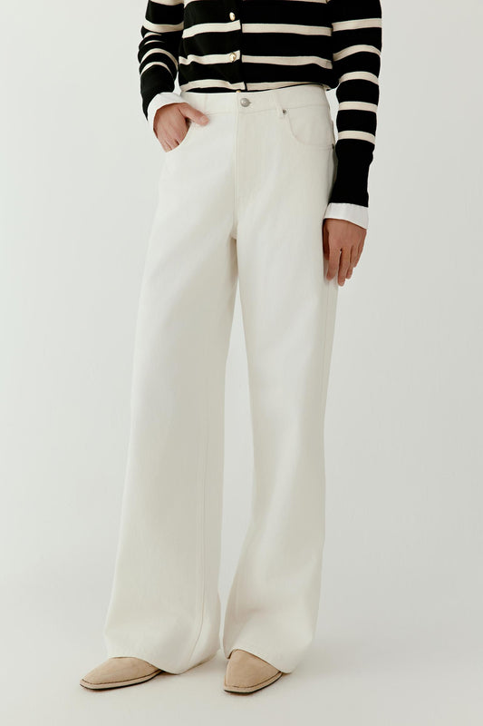 Front view focusing on the wide-leg construction and the natural surface of the undyed cotton denim fabric.
