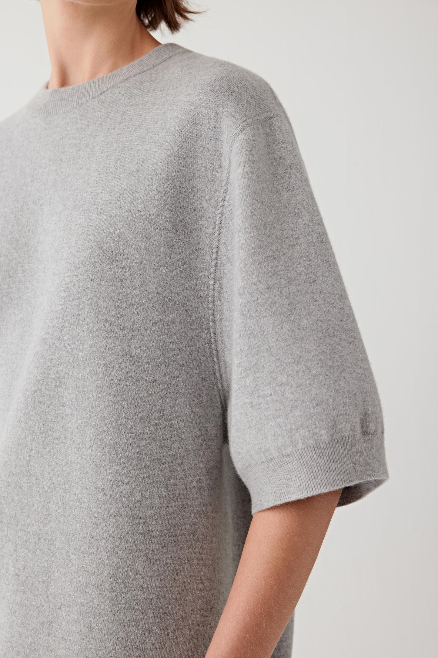 Close-up of the sleeve and hem detail.