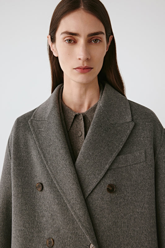 Close-up of the grey wool and silk fabric, highlighting the double-faced weave and soft texture.