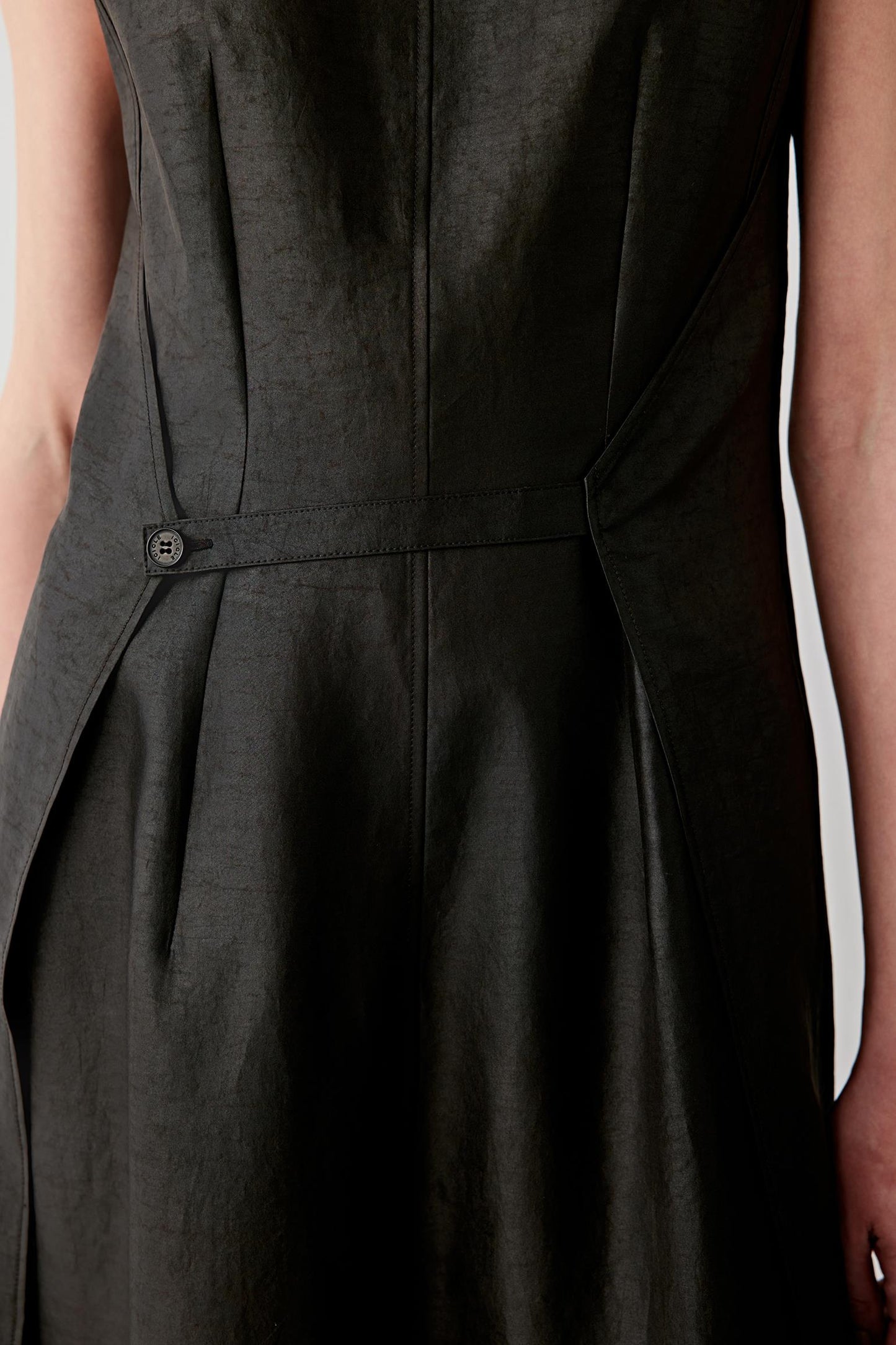 Close-up of skirt showing layered movement, lightness and soft structure