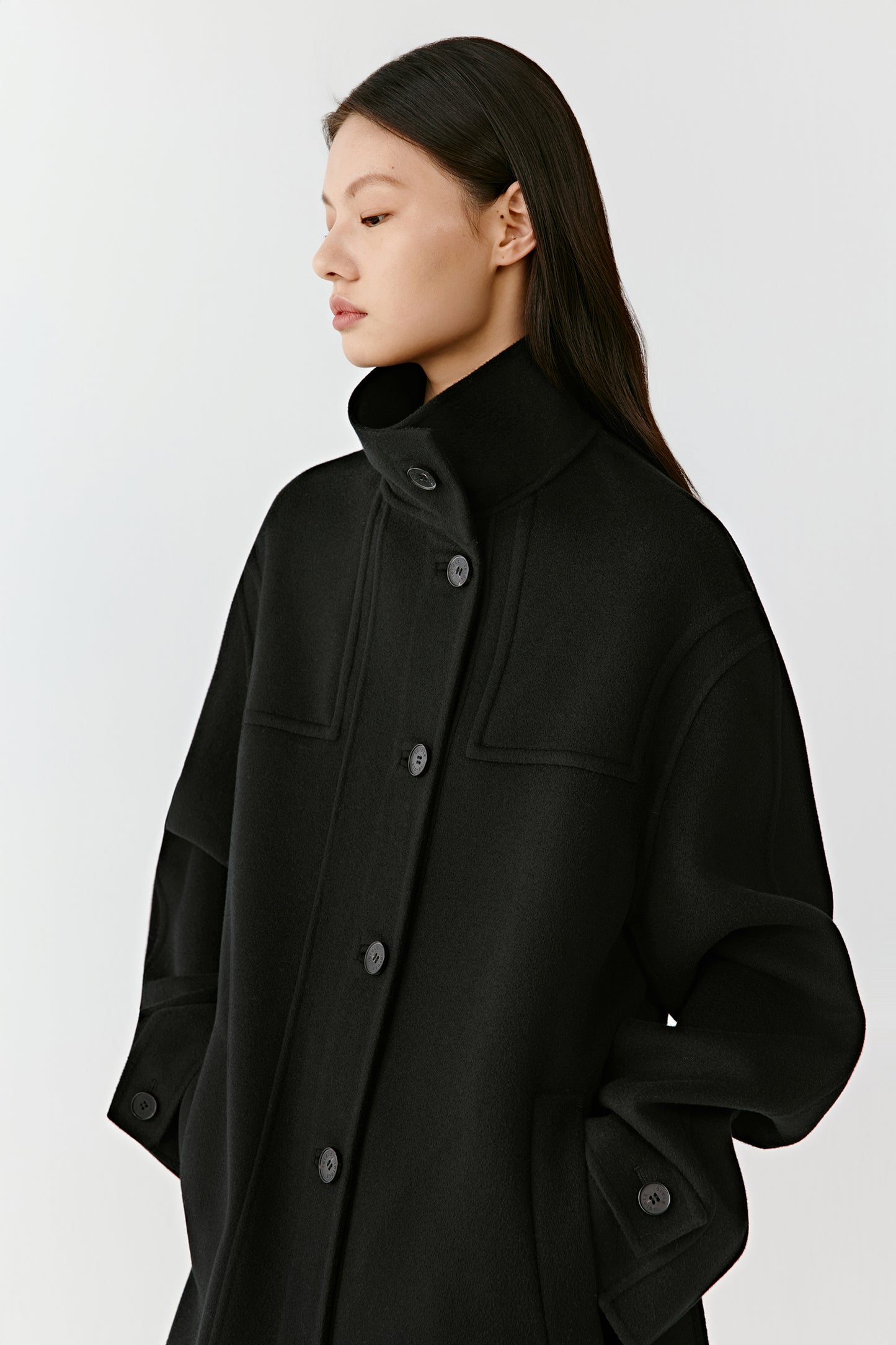 Three-quarter view revealing the clean design and minimalist volume.