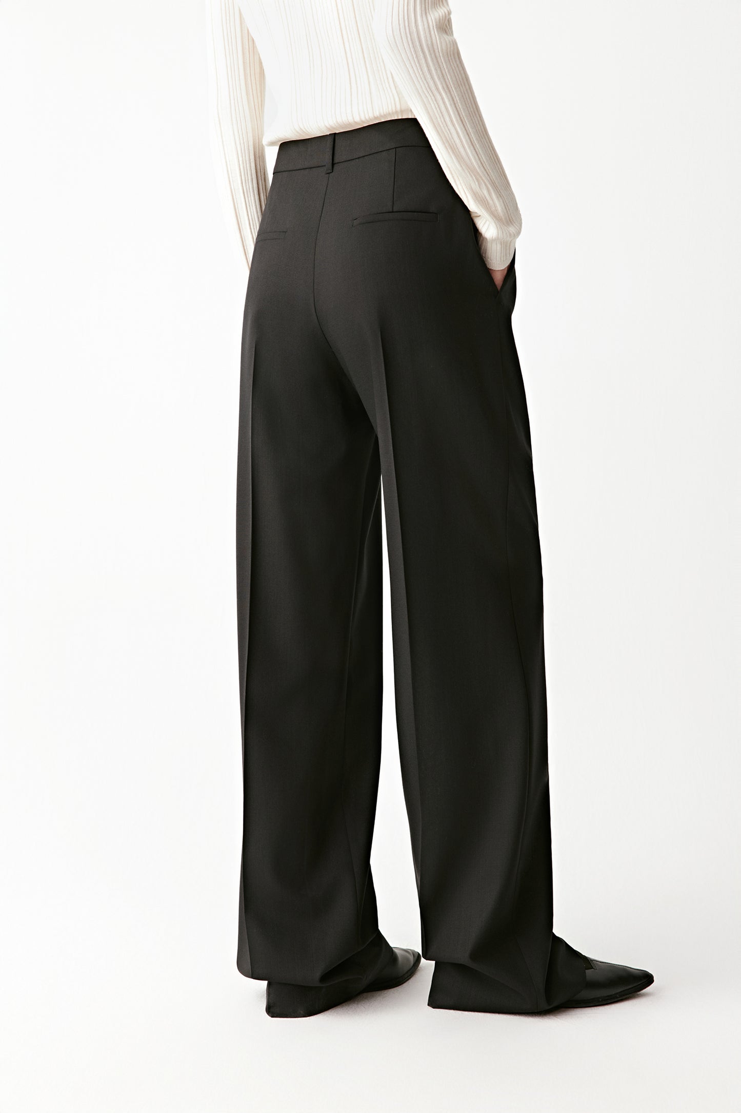 Rear view highlighting the relaxed fit and straight silhouette.