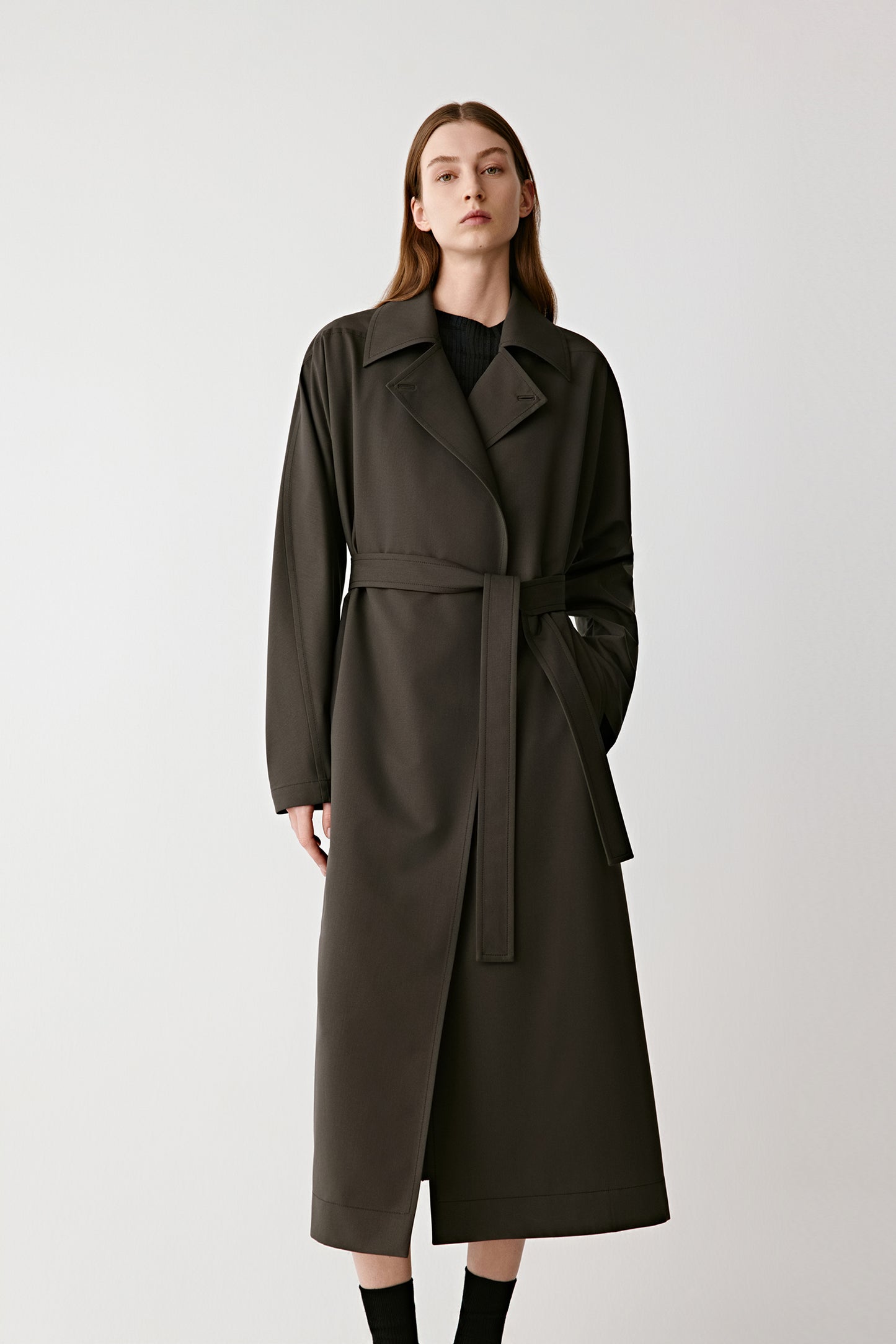 Front view showing the natural drape and movement of the dense DEW fabric.