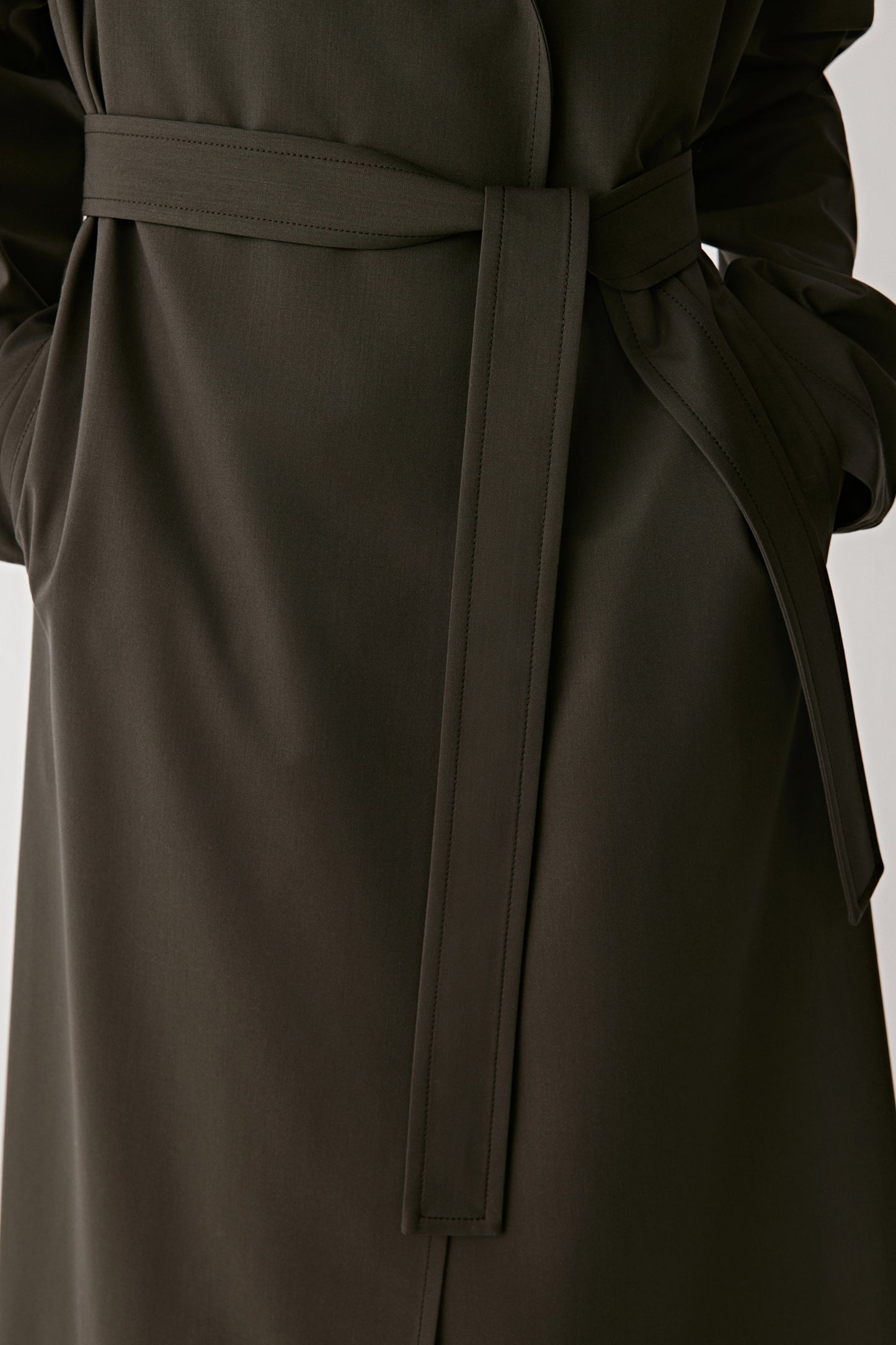 Detail of the tie belt showing the elegant finish.