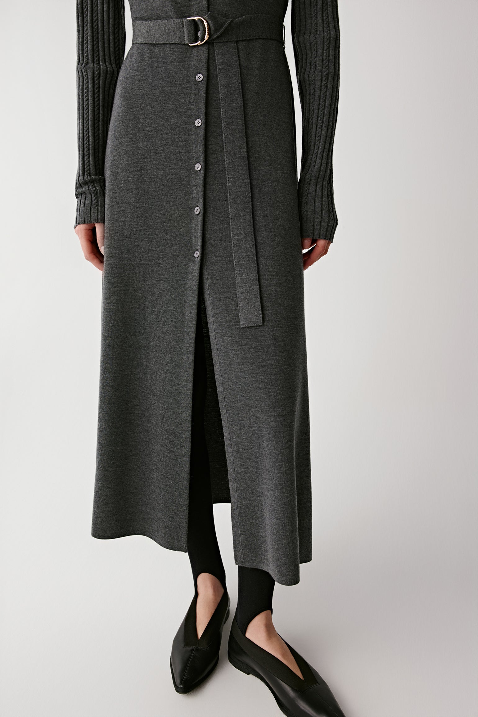 Side view showing the smooth lines and elegant movement of the fabric.