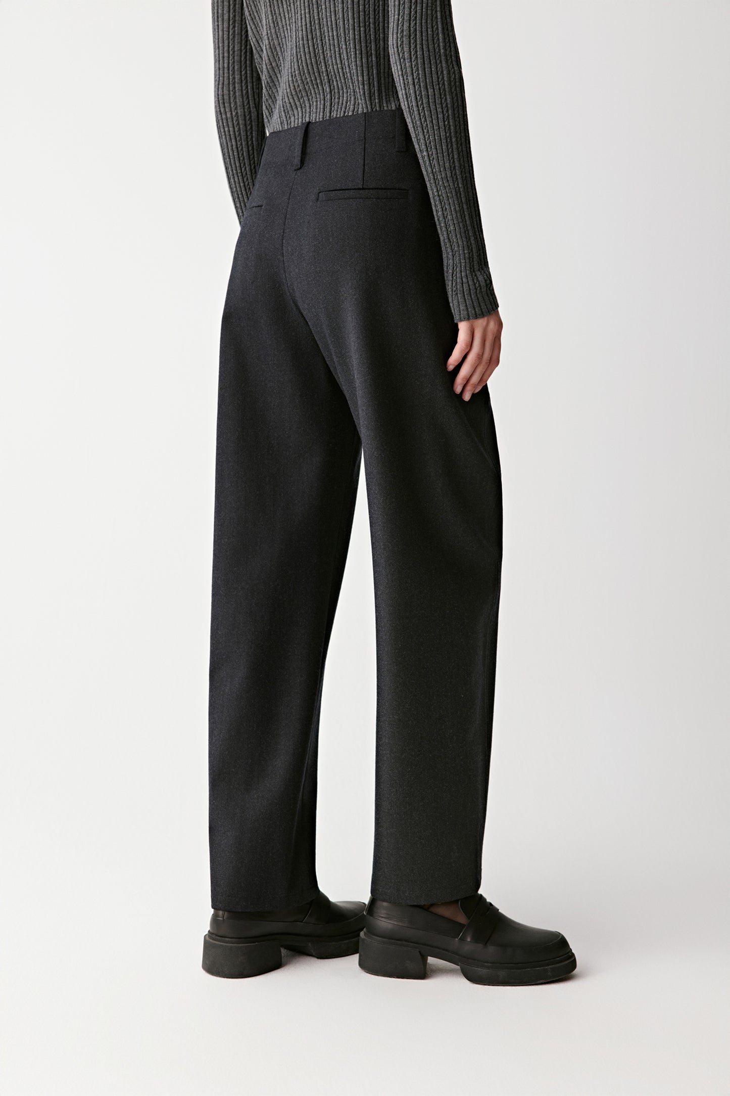 Side view highlighting the smooth drape and ankle-length cut.