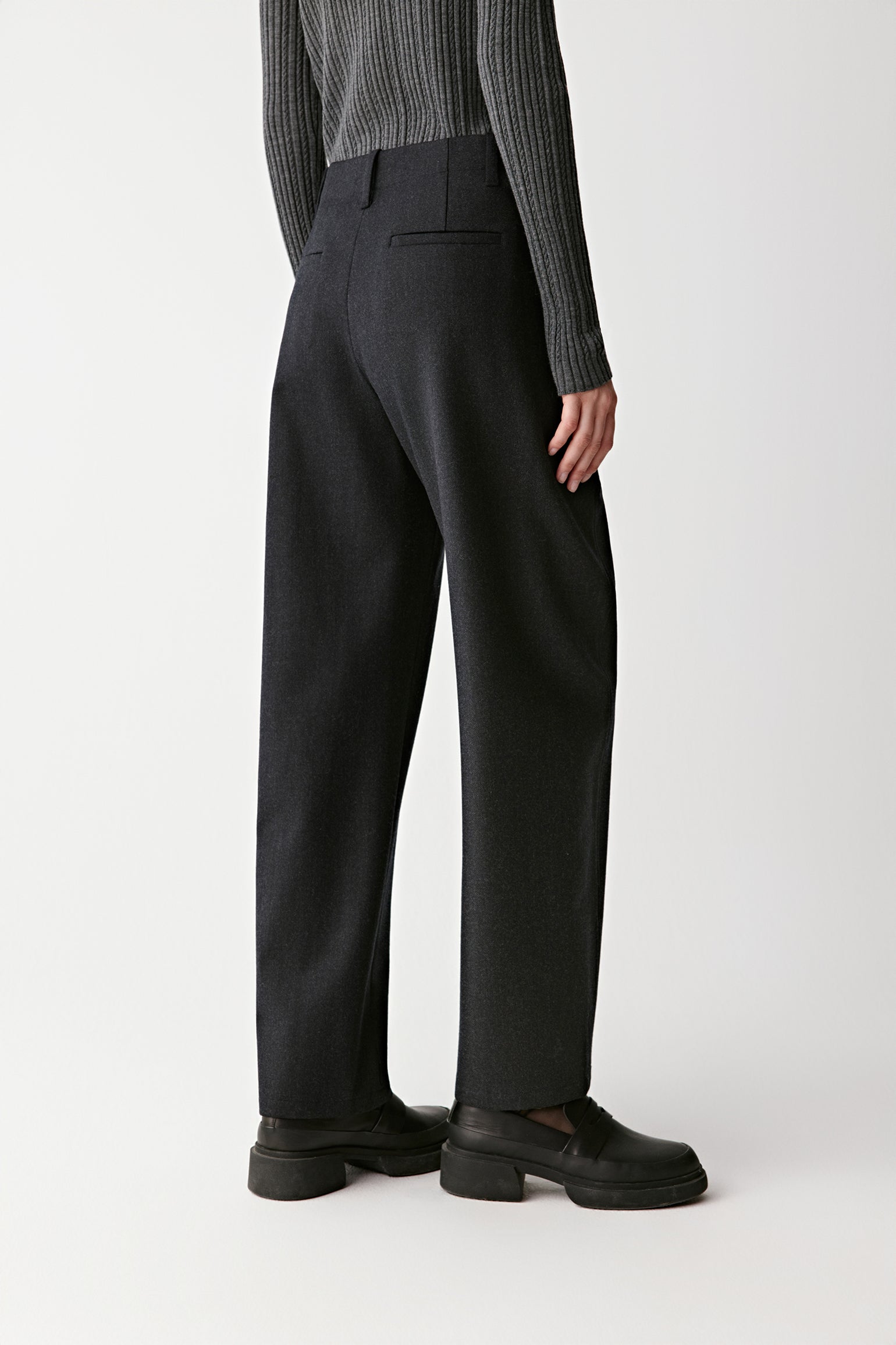 Side view highlighting the smooth drape and ankle-length cut.