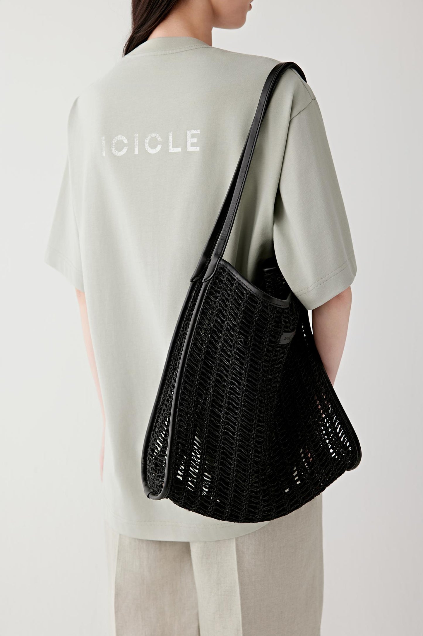 Close-up of mesh texture and interior visibility showing woven construction, openness of the knit and soft structure