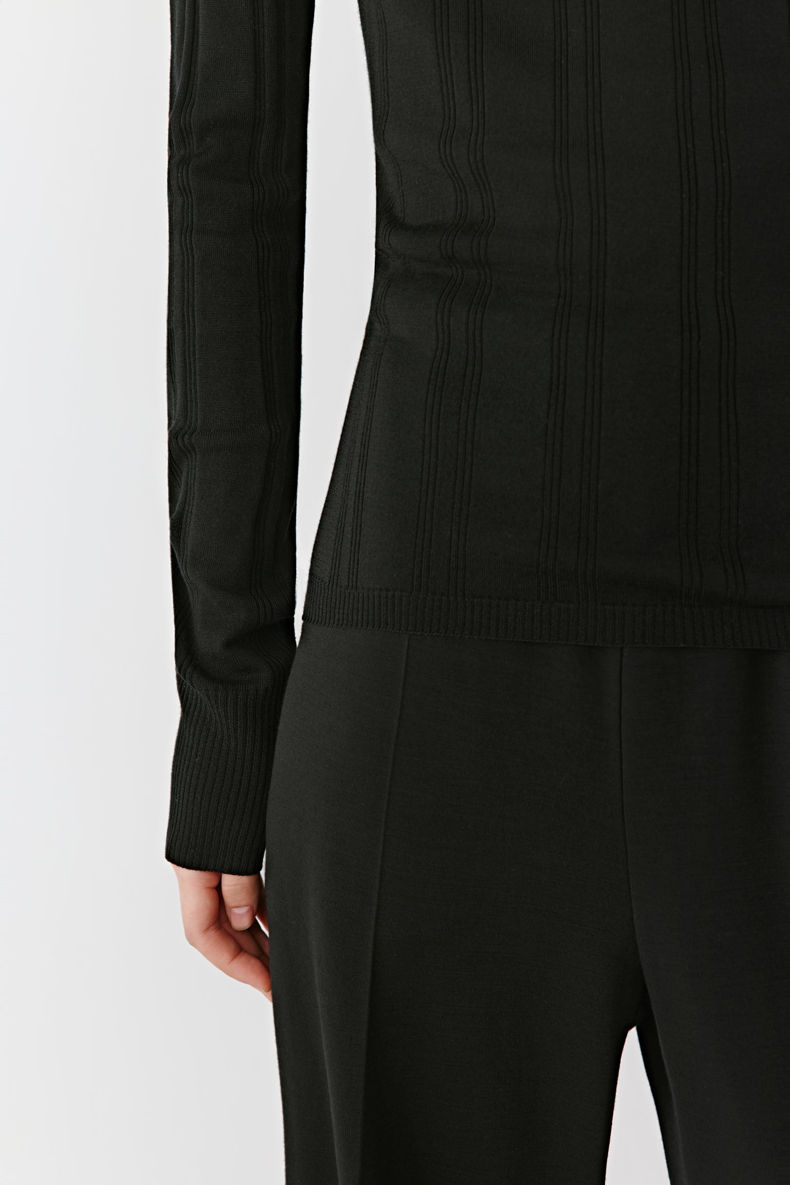 Another detailed shot captures the timeless character of the black shade under soft lighting.