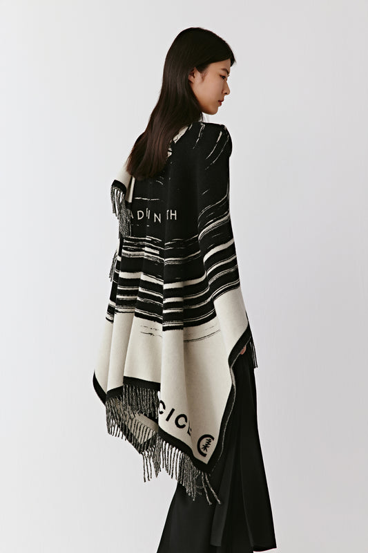 Side view highlighting the bold contrast of the patterns, the ICICLE logo and the flowing drape.