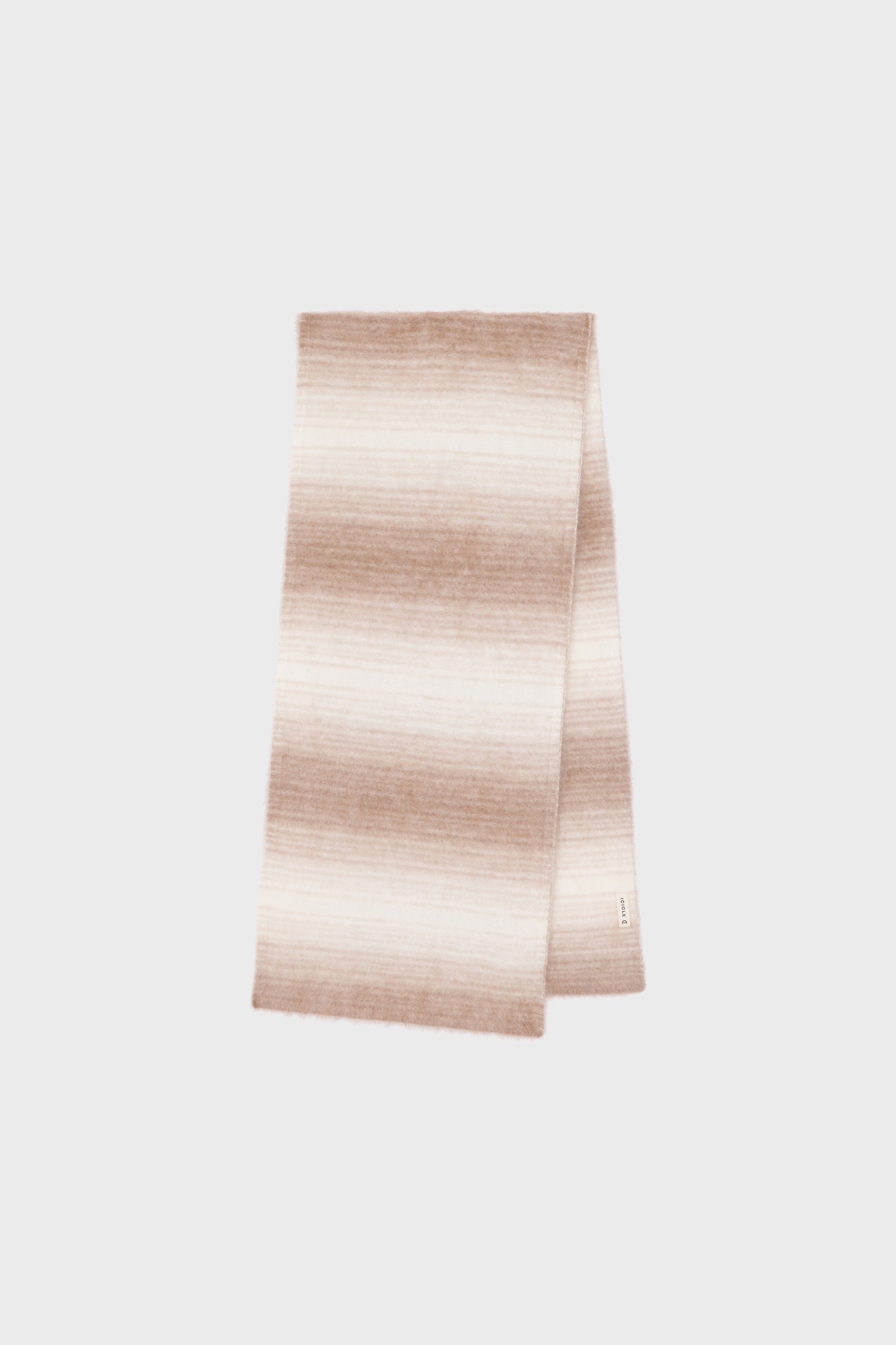 Front view of a long cashmere scarf featuring a subtle camel and beige gradient on a light background.