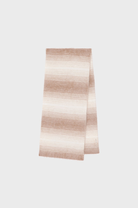Front view of a long cashmere scarf featuring a subtle camel and beige gradient on a light background.