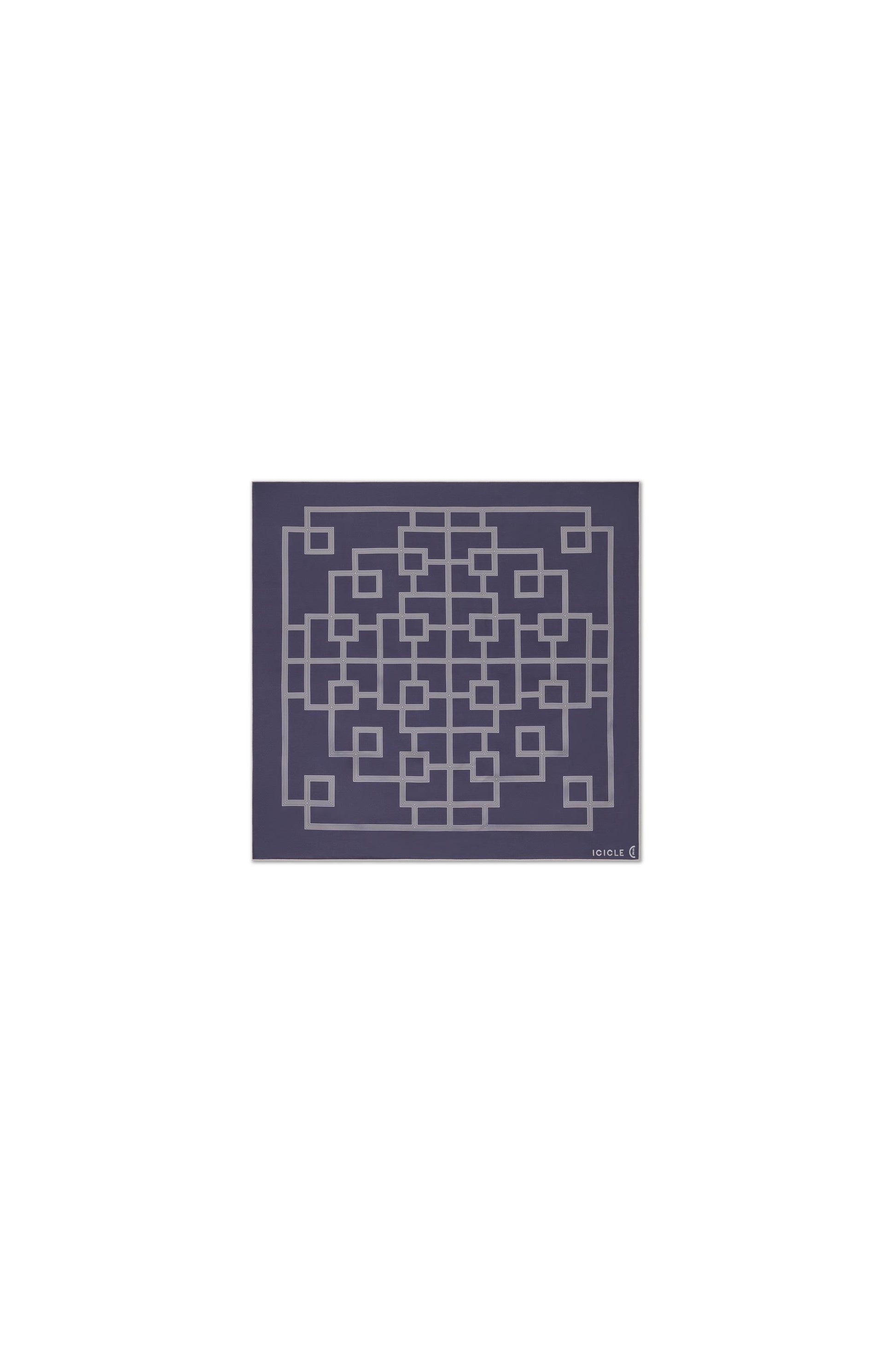 Flat lay detail showing the square format and contrasting border.