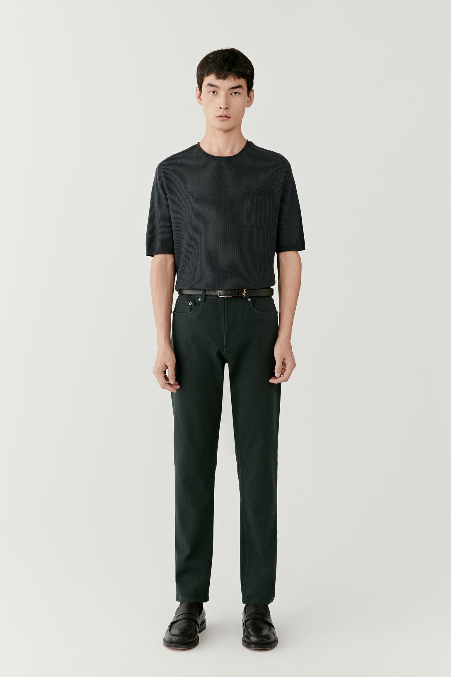 Full-length front view highlighting the straight silhouette, even drape and balanced proportions with matching trousers.