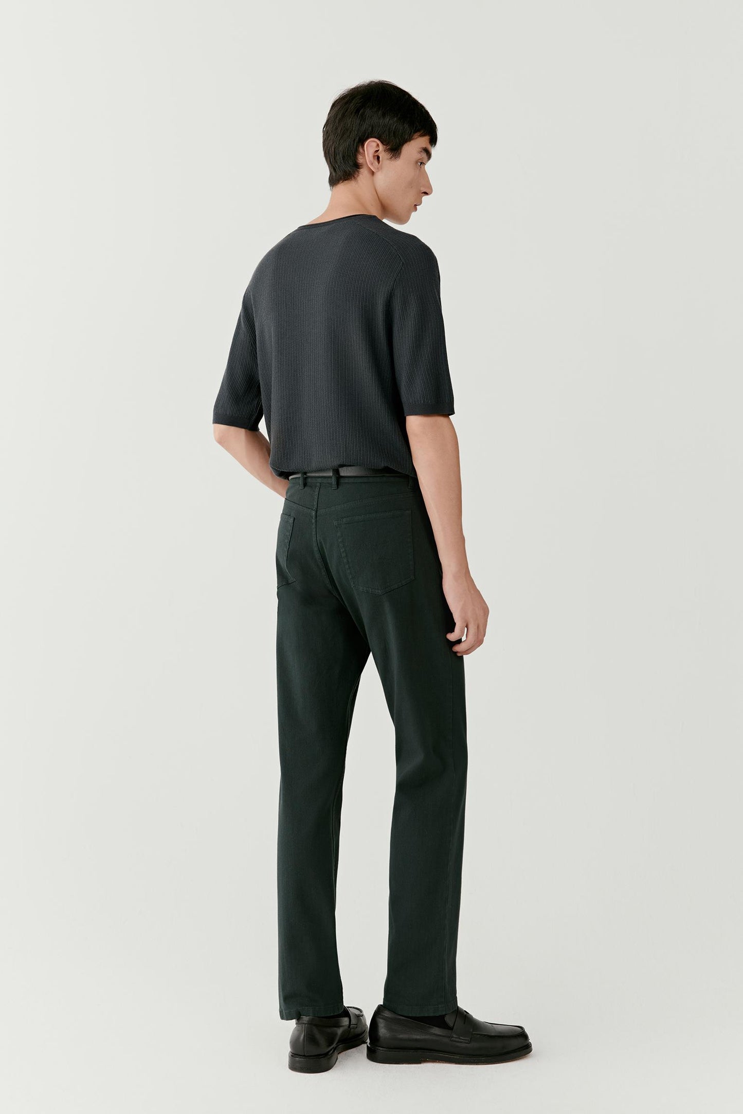 Back view showing the clean fall from shoulder to hem and natural ease through the body.