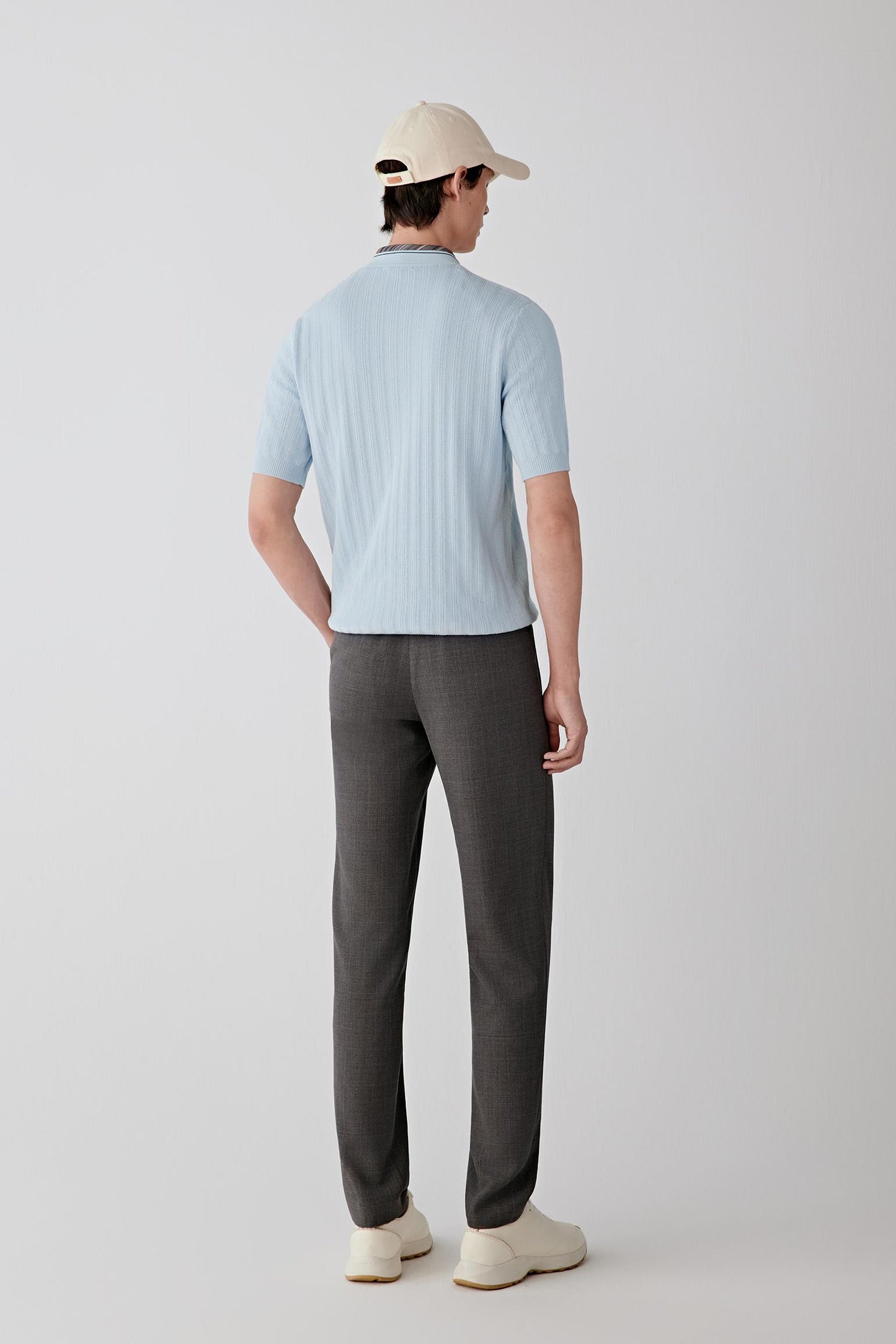 Full-length back view highlighting a clean back panel and straight hem.