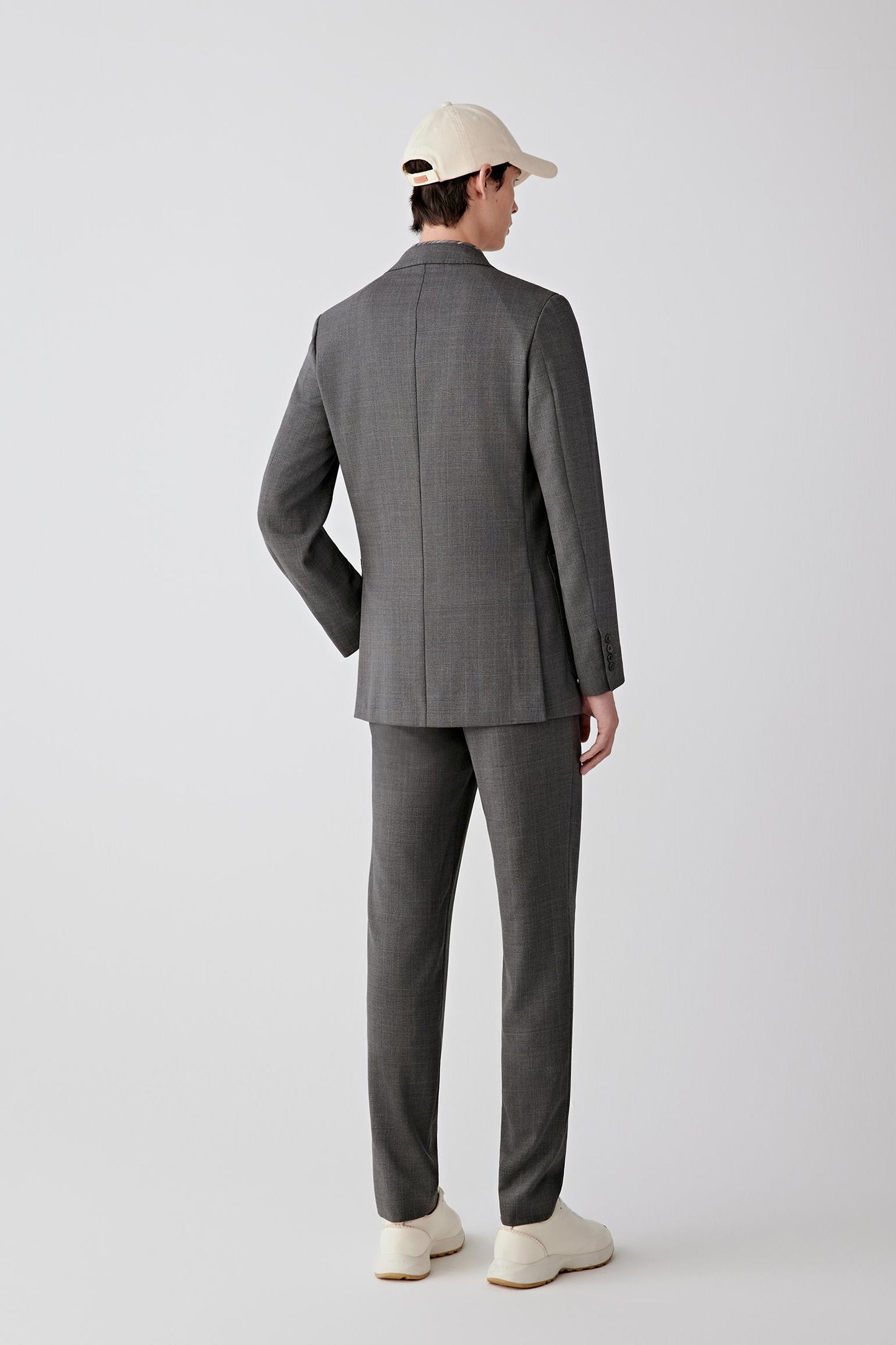 Full-length back view showing the straight silhouette.