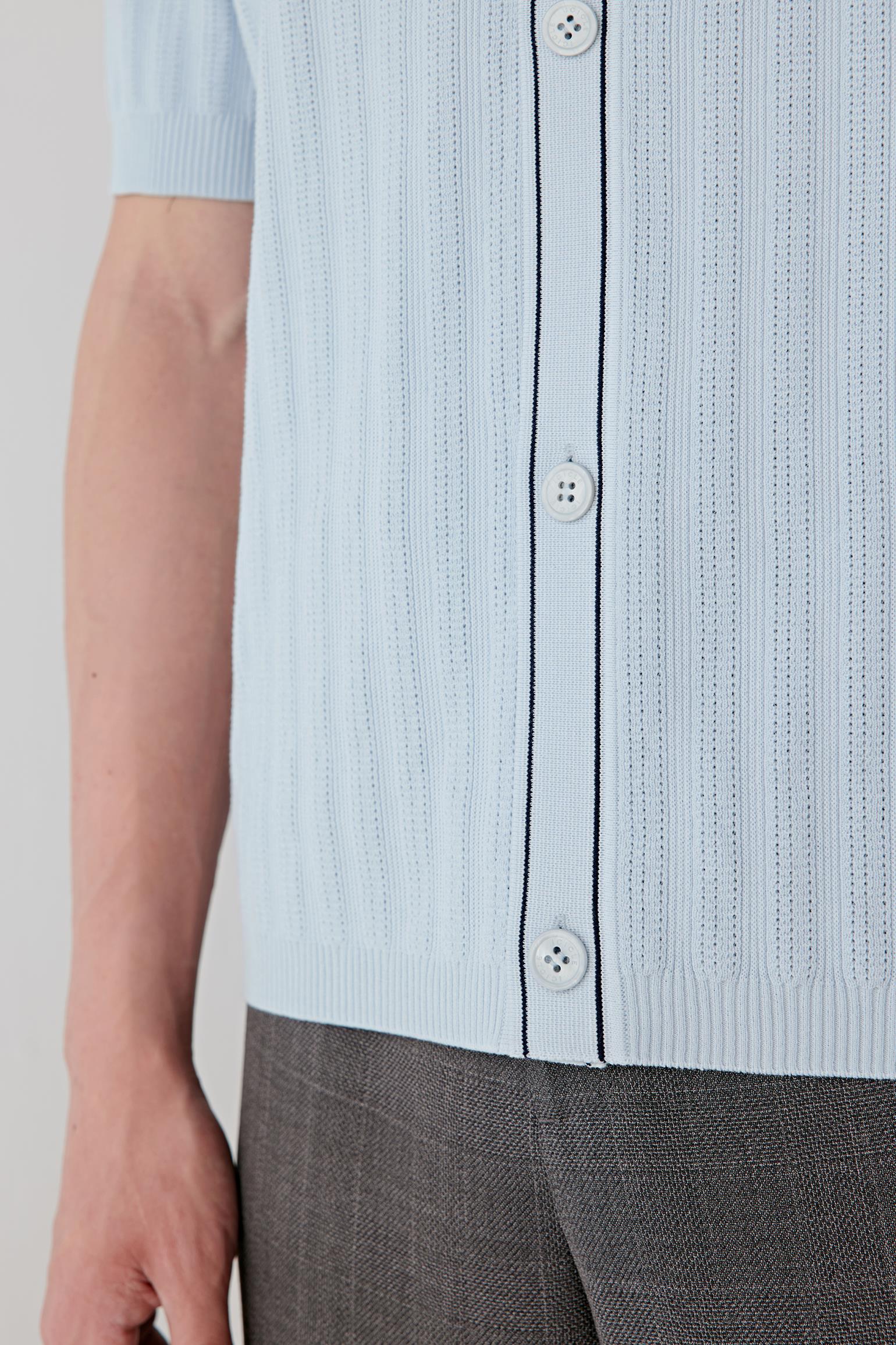 Fabric detail revealing the breathable knitted cotton texture.