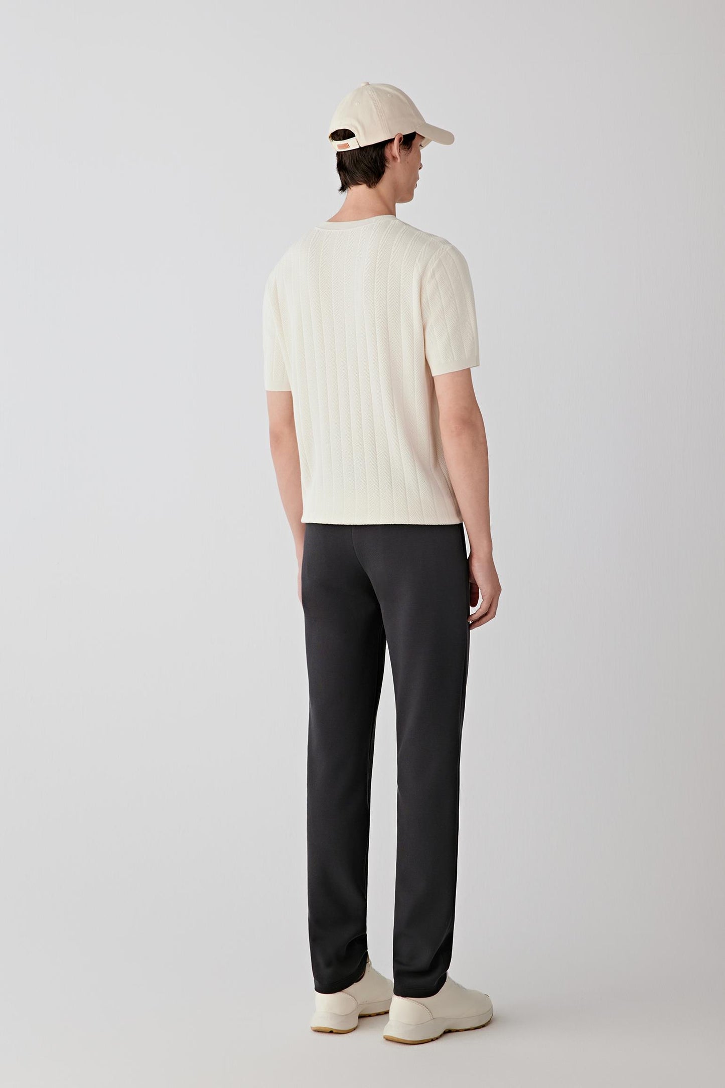 Full-length back view highlighting a straight hem and minimal design.