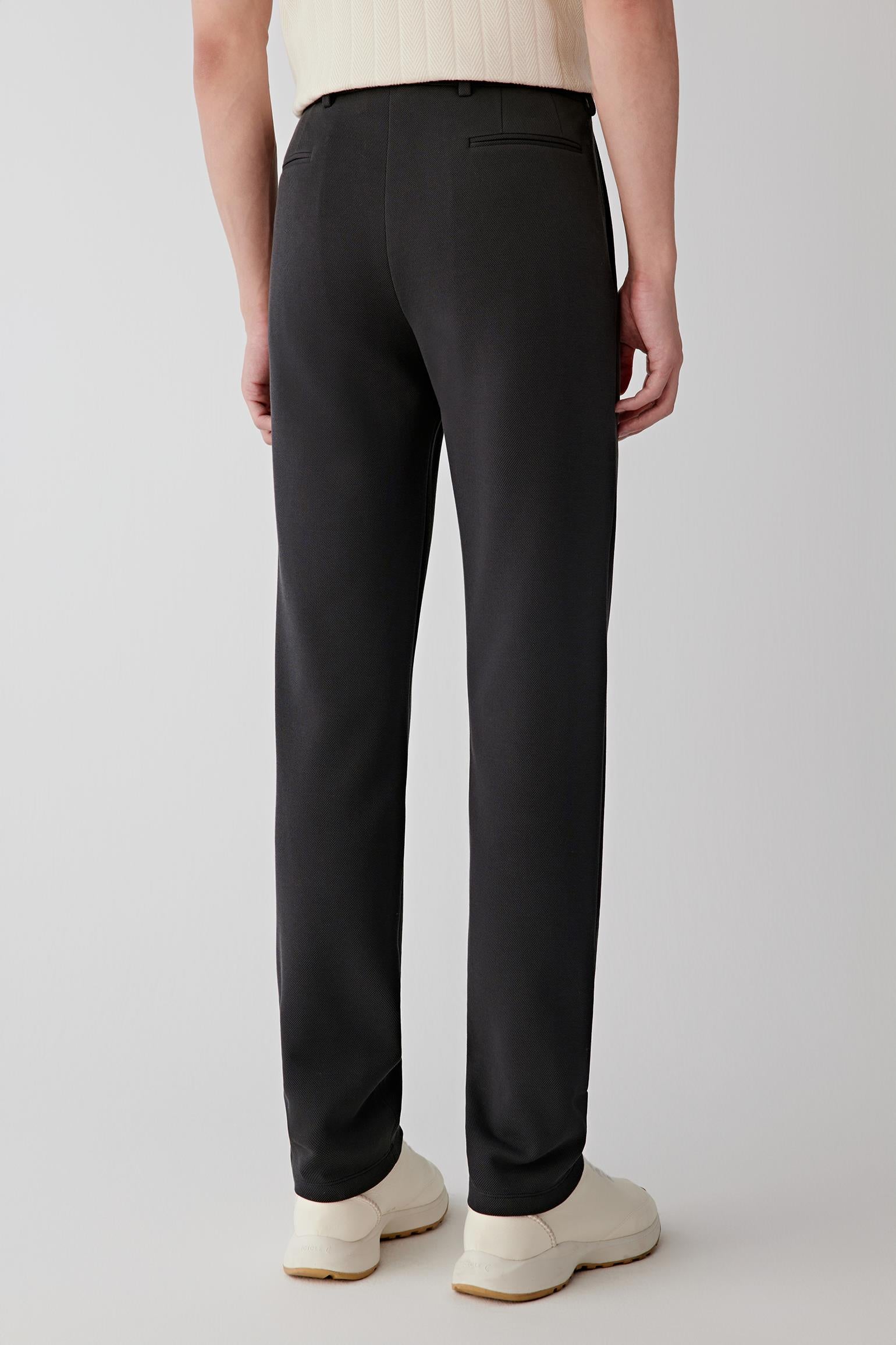 Back view of the trousers, highlighting discreet back pockets.