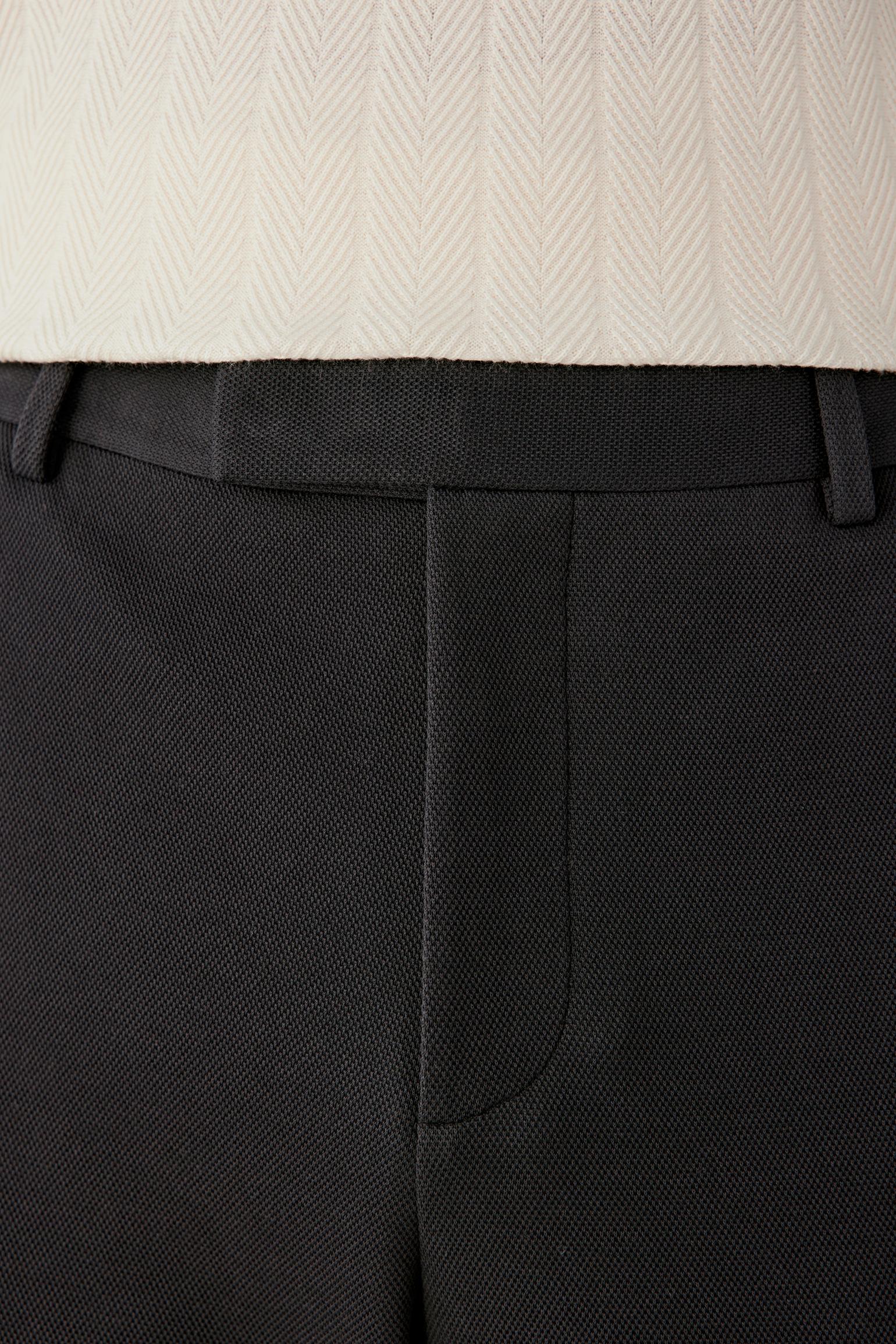 Close-up of the waistband and rear seam.