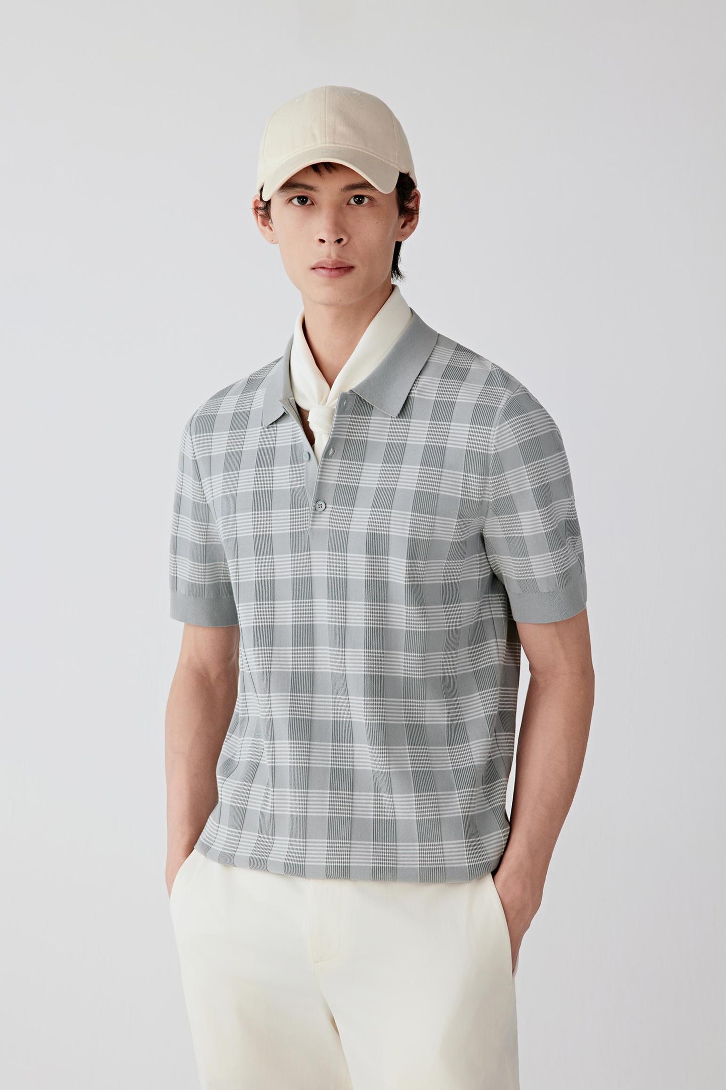 Mid-length front view highlighting the short sleeves with clean hems, straight body line and even knit structure, with the fabric falling naturally without cling.