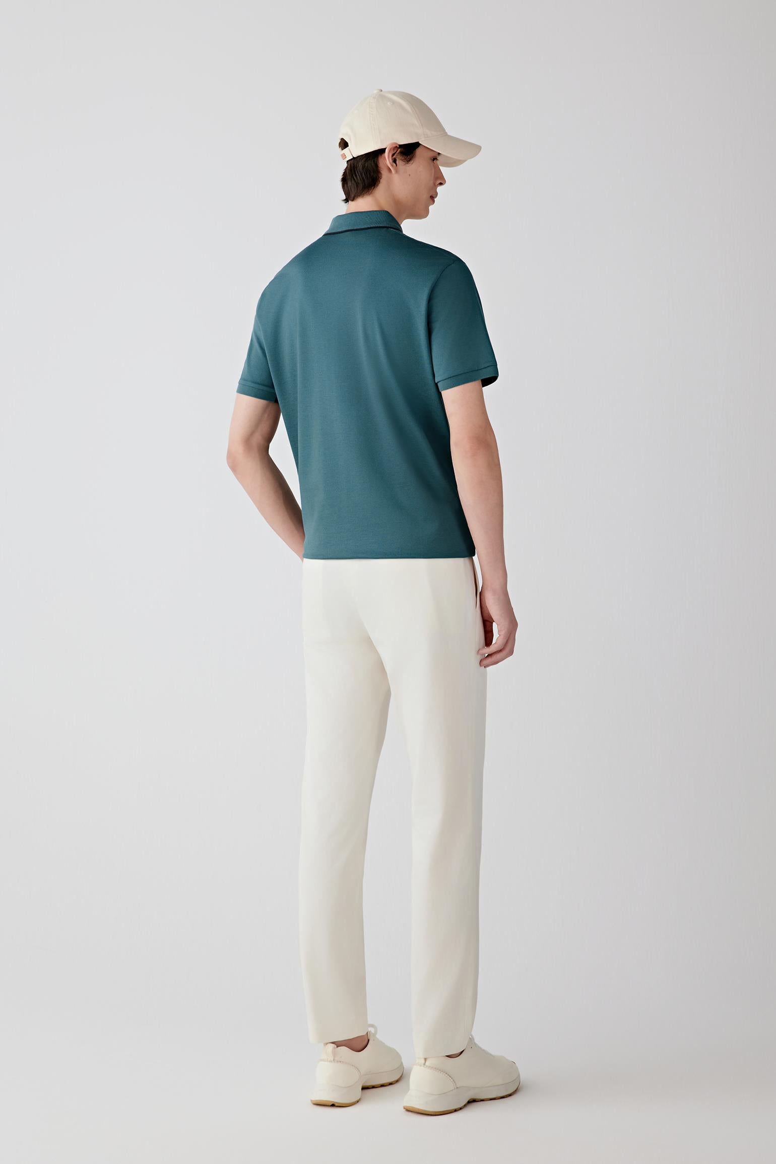 Back view showing the natural fall of the garment, light structure at the shoulders and ease through the body.