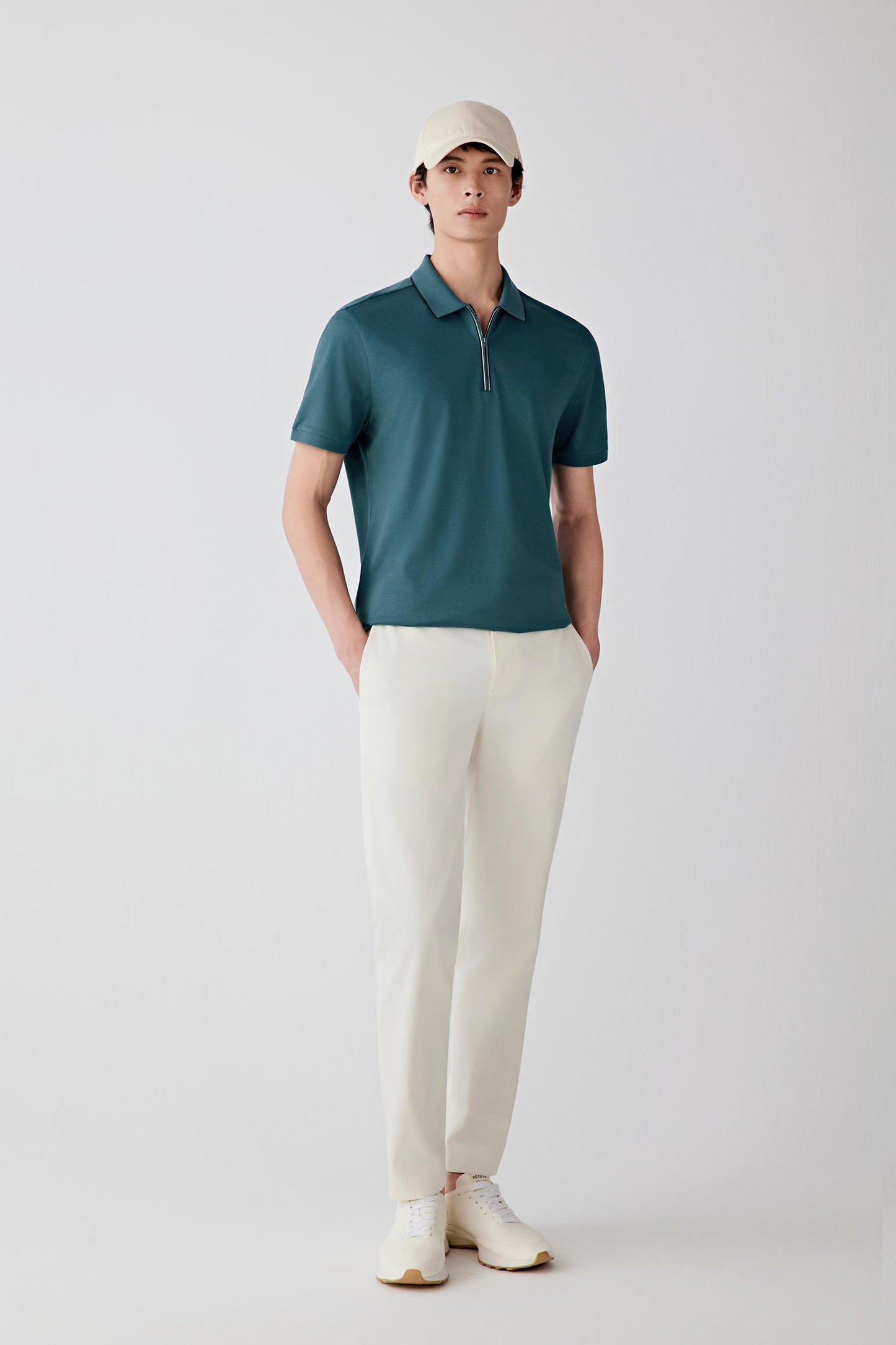 Full-length view emphasizing the balanced proportions and fluid movement of the fabric, with the polo sitting cleanly at the hip.