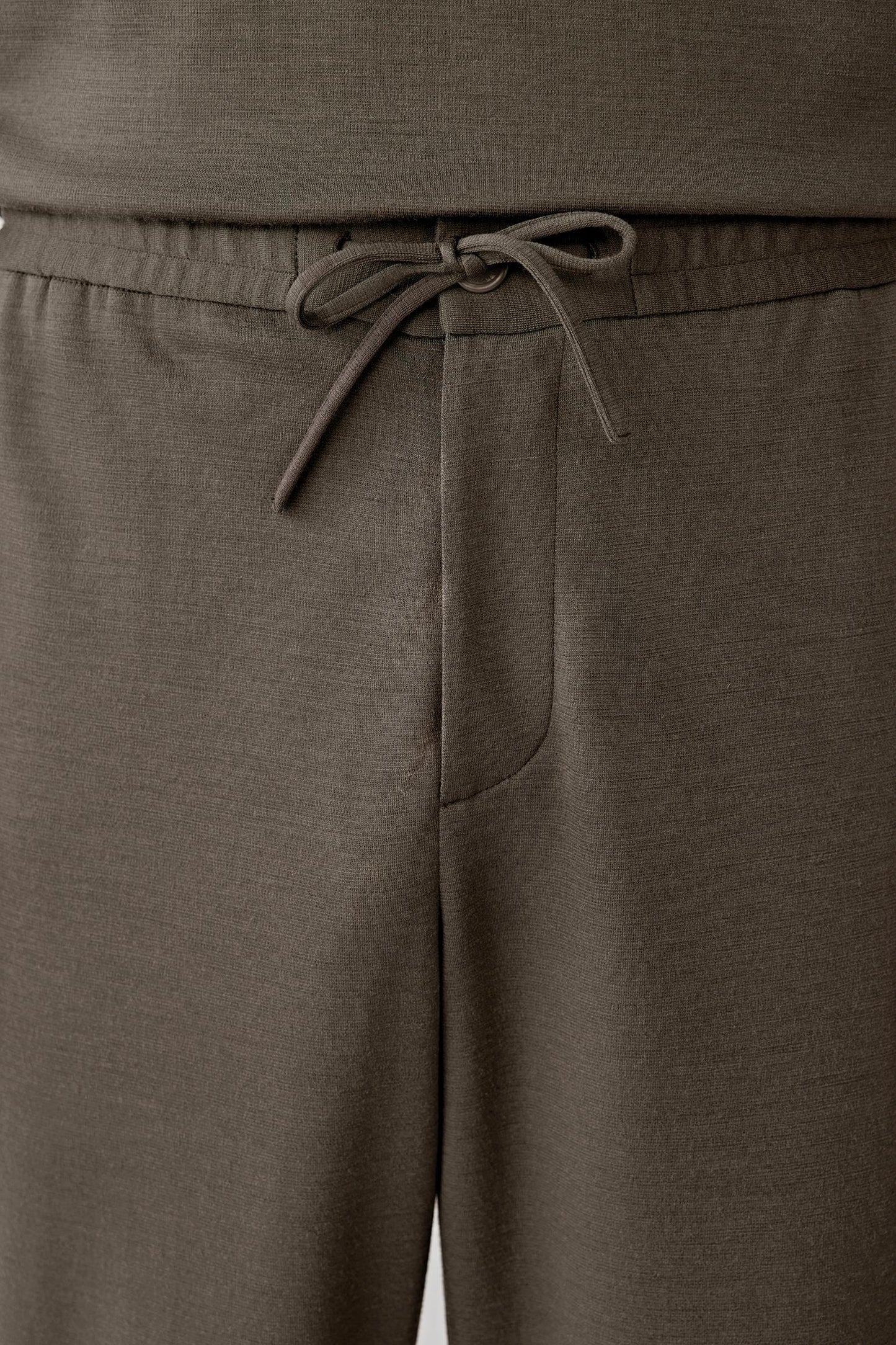 Close-up of the drawstring waistband detail.
