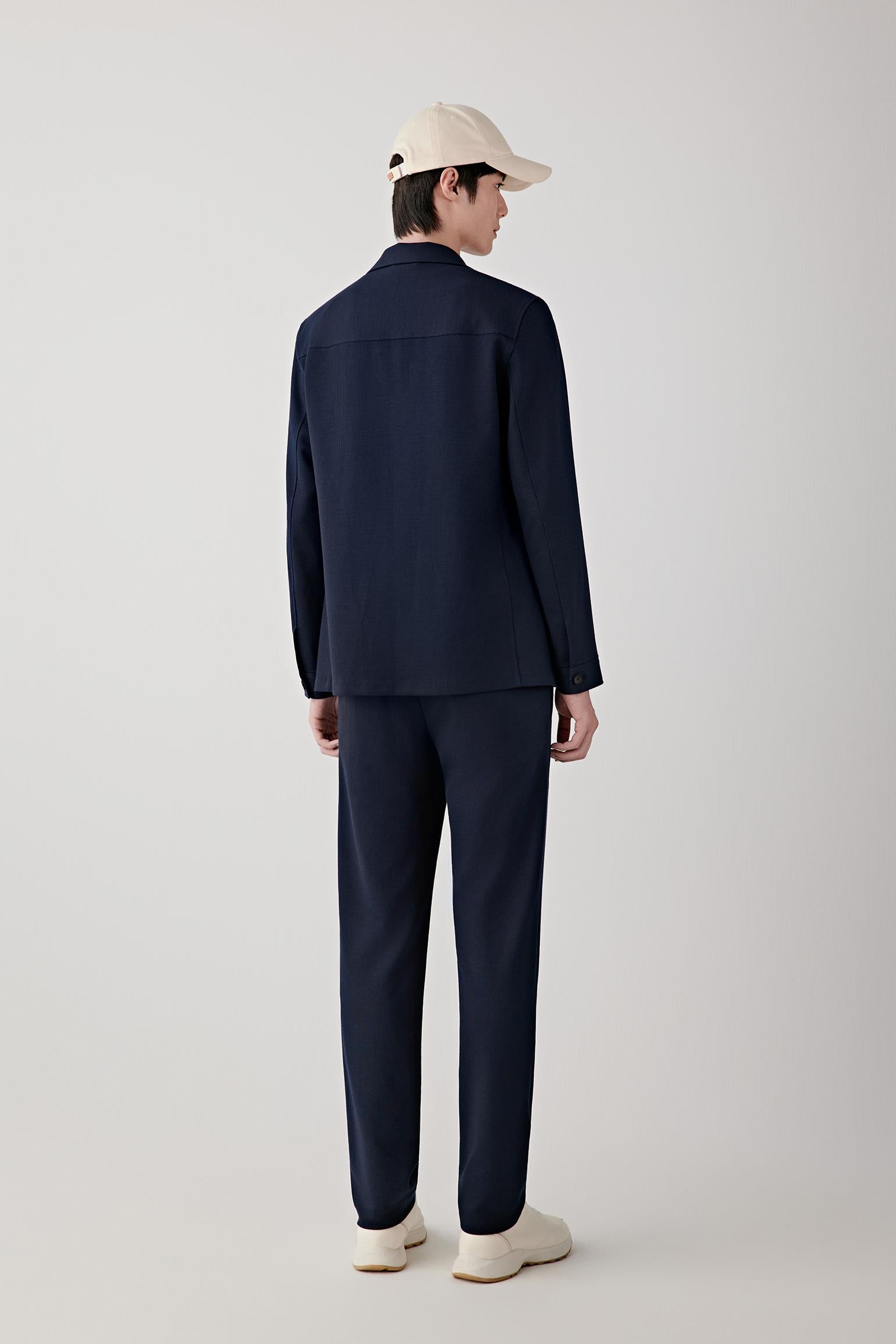 Back view showing the clean back panel, straight shoulder line and smooth drape of the fabric.