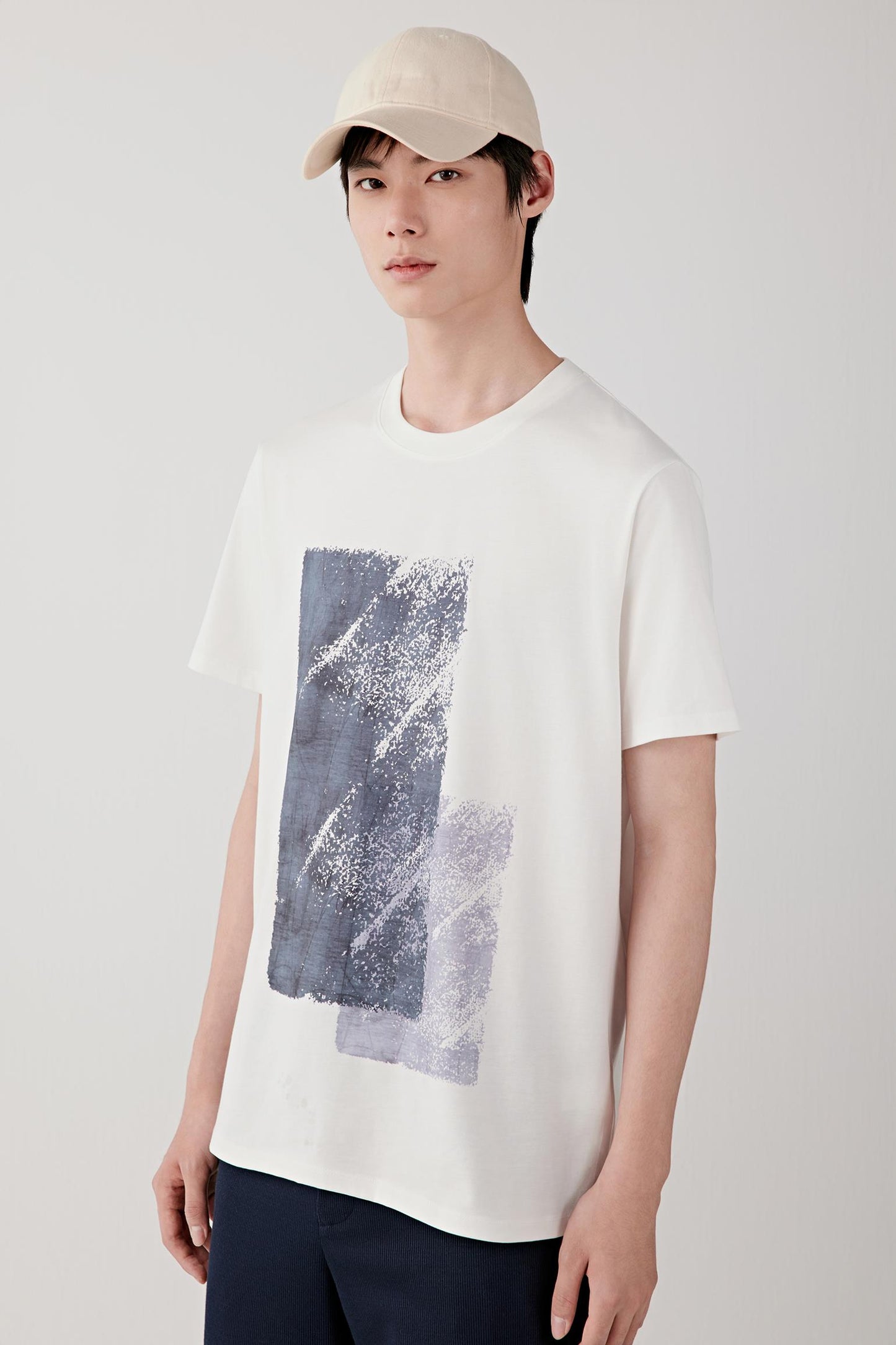 Mid-length front view highlighting the short sleeves, straight cut and smooth, lightweight jersey texture, with the graphic clearly visible on the chest.