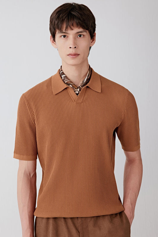 Mid-length front view focusing on the upper body, emphasizing the short collar, subtle V opening and the fine ribbed structure, with the warm brown tone enhancing the uniformity and depth of the knit