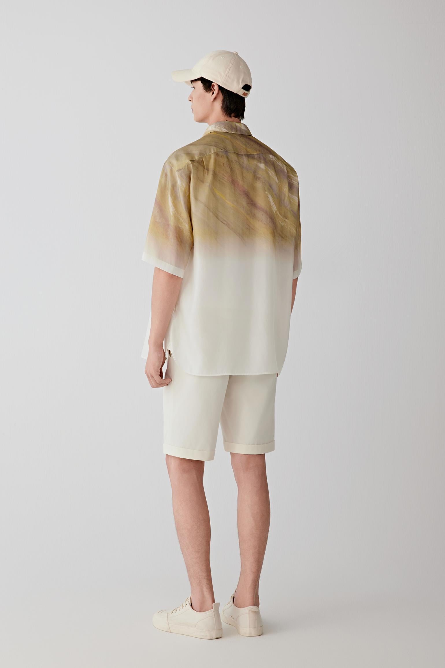 Back or side view emphasizing the crisp construction and clean silhouette. The gradient tonal effect introduces depth across the smooth woven surface.