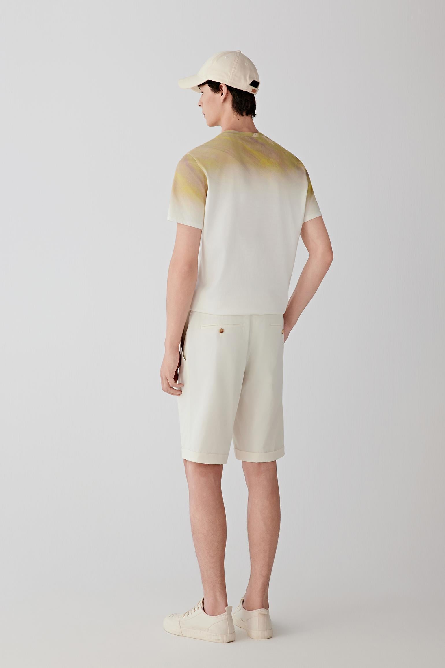 Side or three-quarter view emphasizing the fluid drape and subtle tonal gradient across the fabric surface. The soft jersey construction enhances the relaxed silhouette.