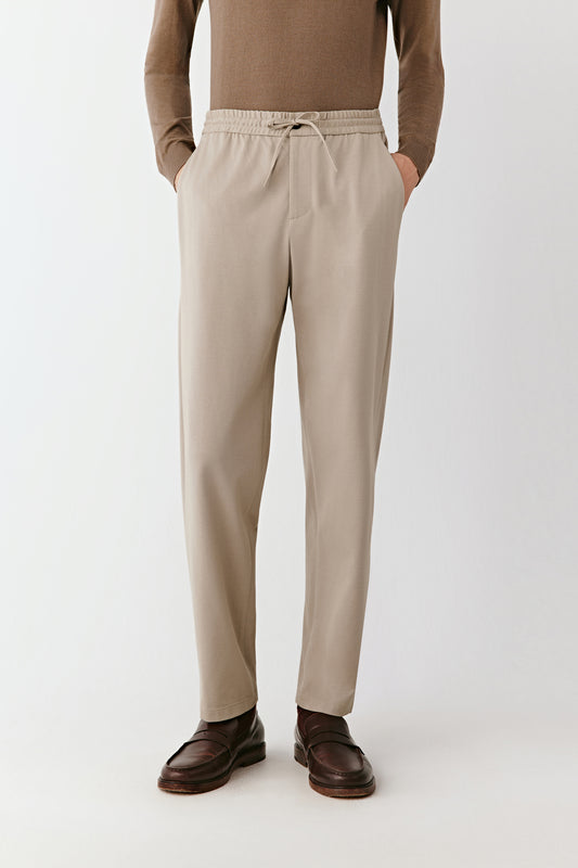 A front close-up captures the fine texture of the piqué cotton and precise stitching.