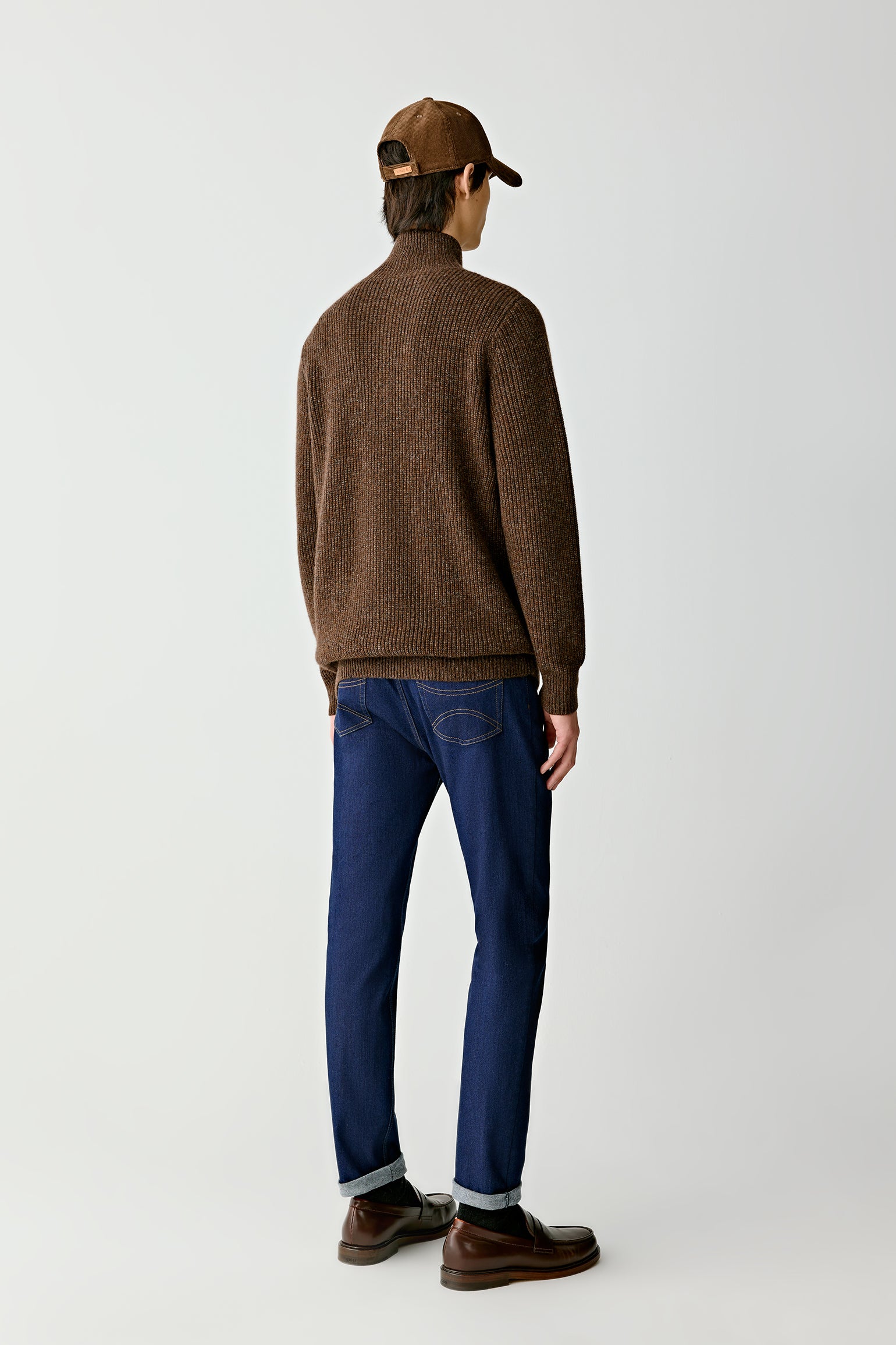 Back view of the cardigan, highlighting the smooth texture and structure.