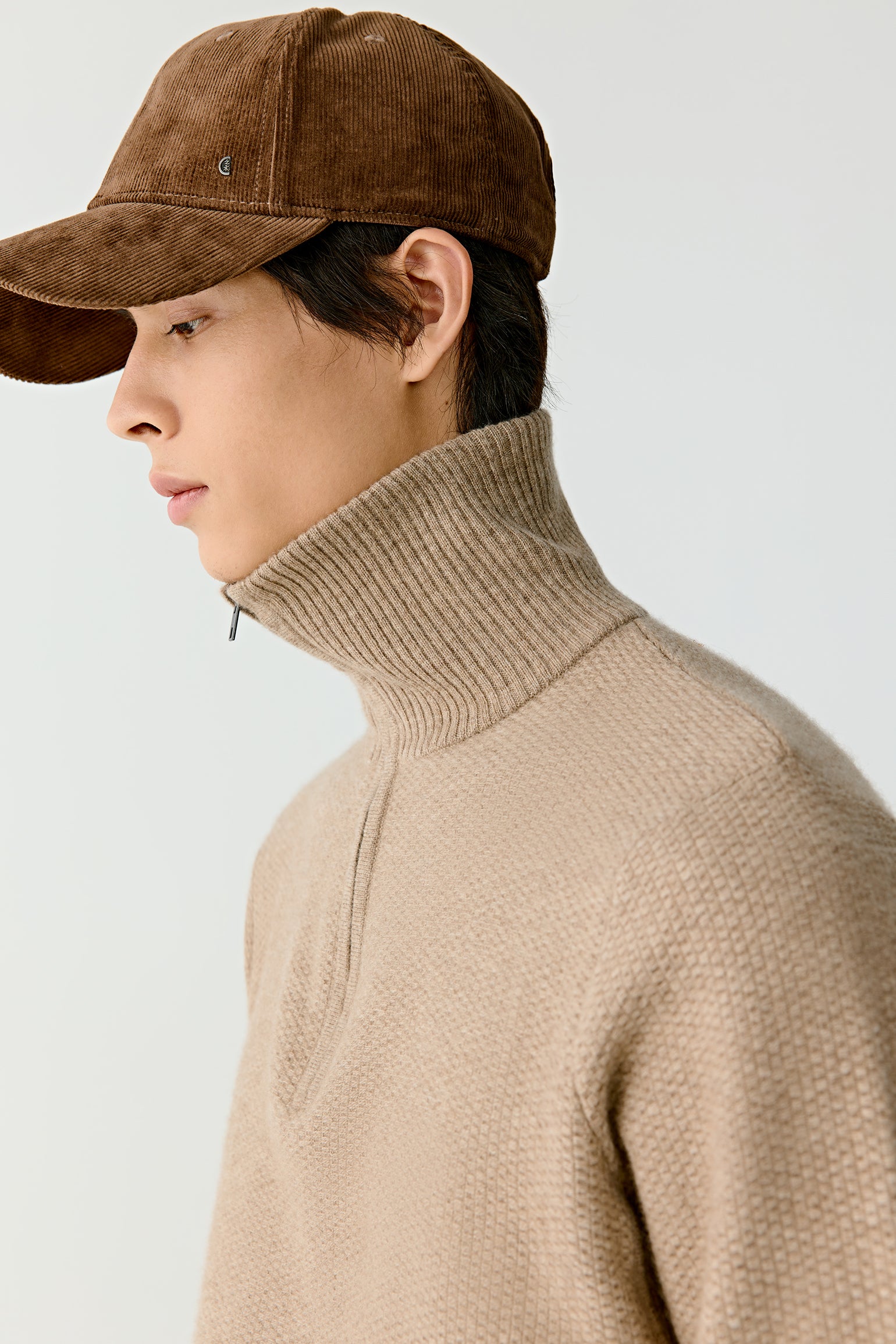 Back view of the zip cashmere pullover, highlighting the clean lines and fine texture.