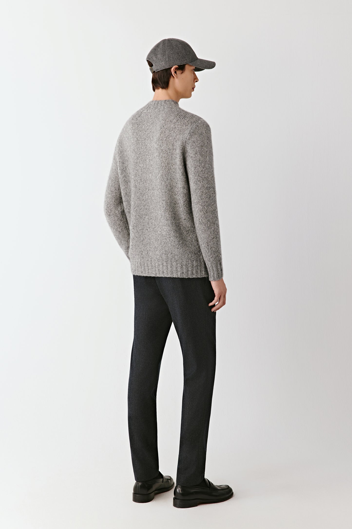 Back view of the cashmere and silk pullover, highlighting the soft drape and smooth finish.